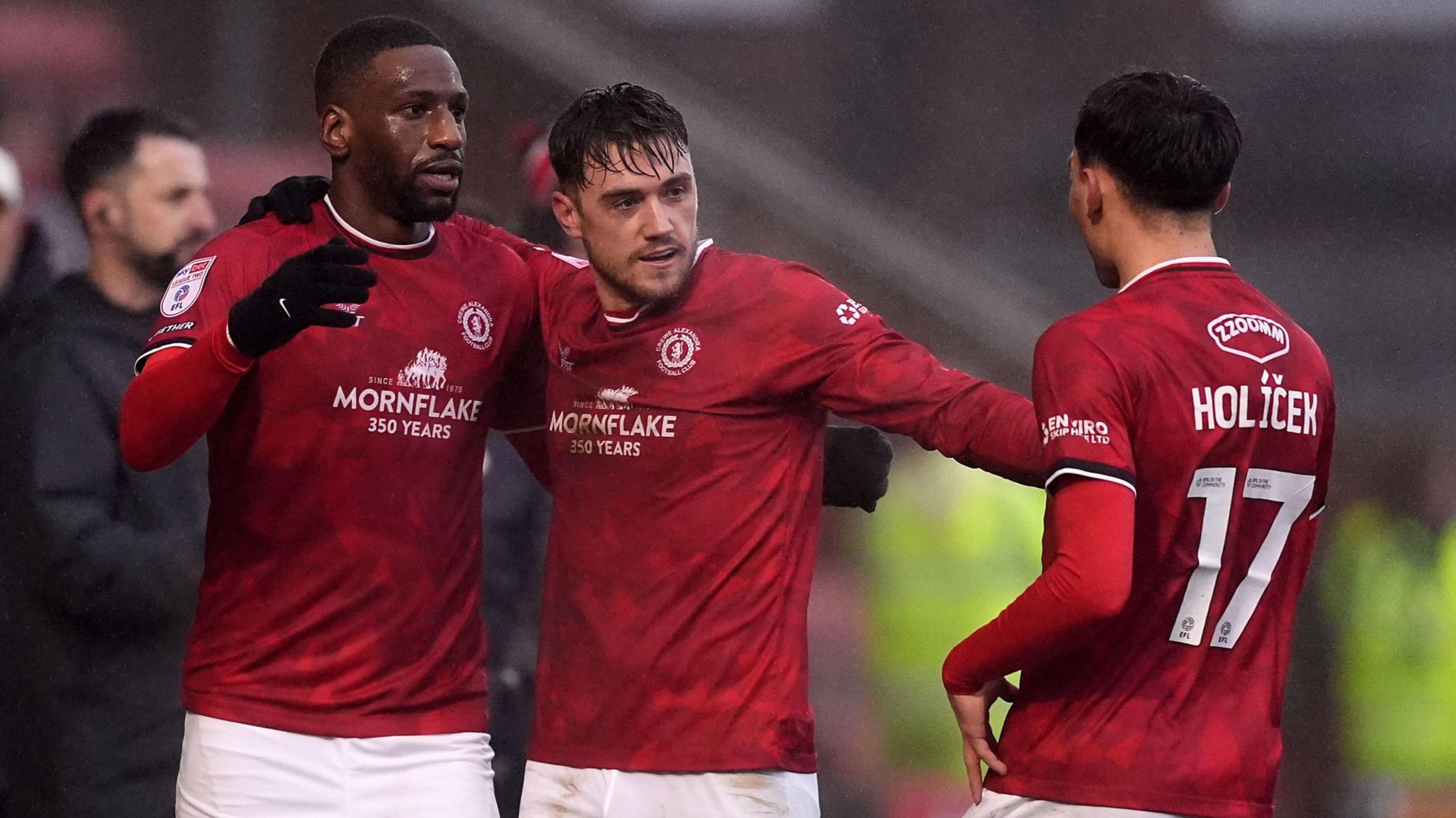 Crewe players celebrate a goal