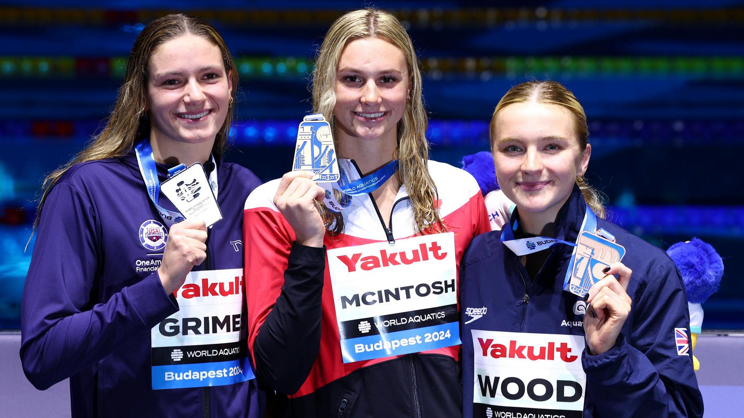 Katie Grimes (left), Summer McIntosh (centre) and Abbie Wood