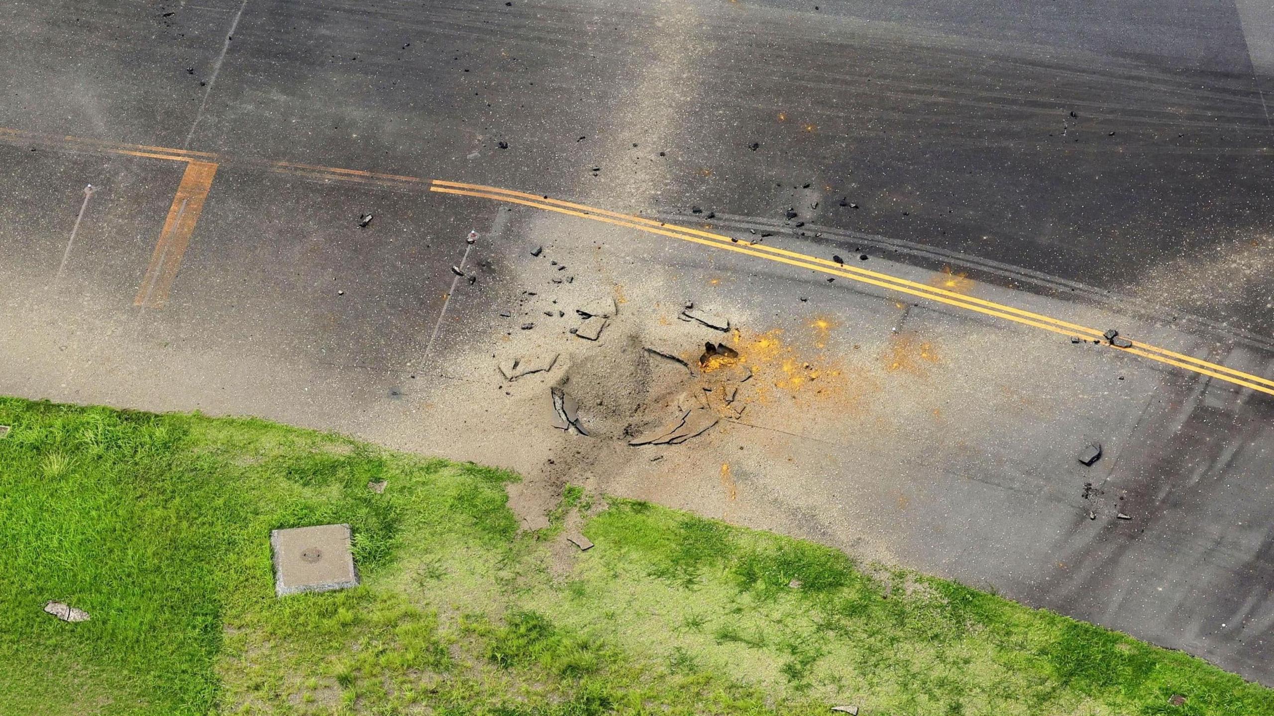 A crater on a taxiway at Miyazaki Airport