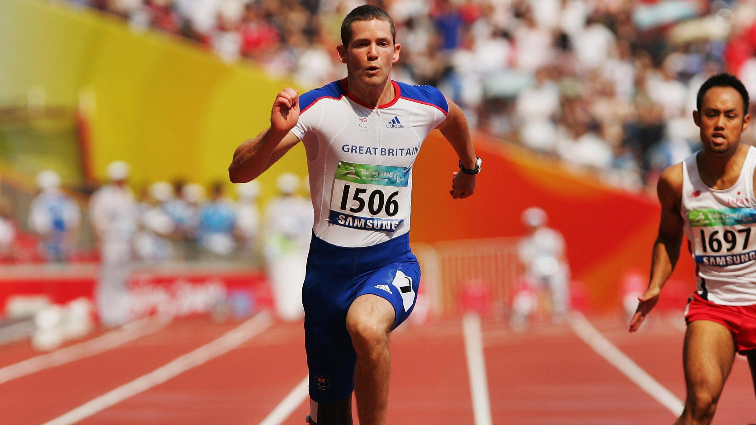 John McFall of Great Britain competes in the final of the Men's 100M -T42 Athletics event at the National Stadium during day eight of the 2008 Paralympic Games on September 14, 2008 in Beijing, China.