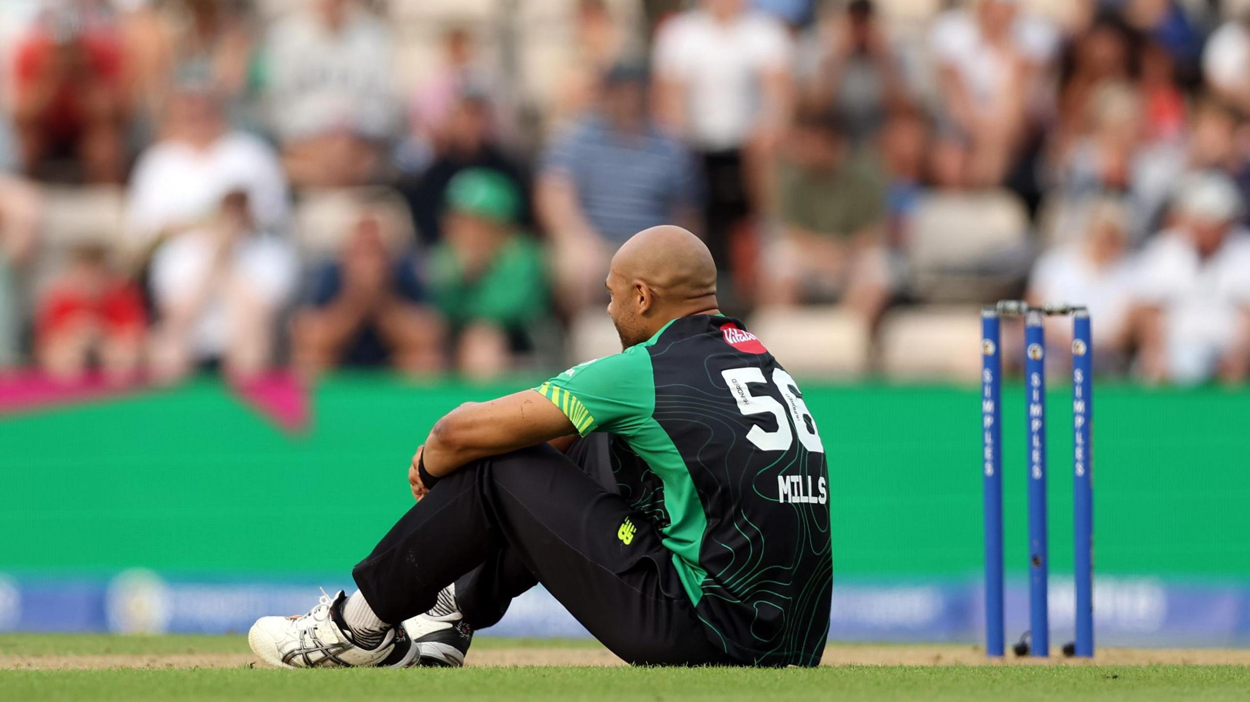 Southern Brave bowler Tymal Mills looks dejected after defeat