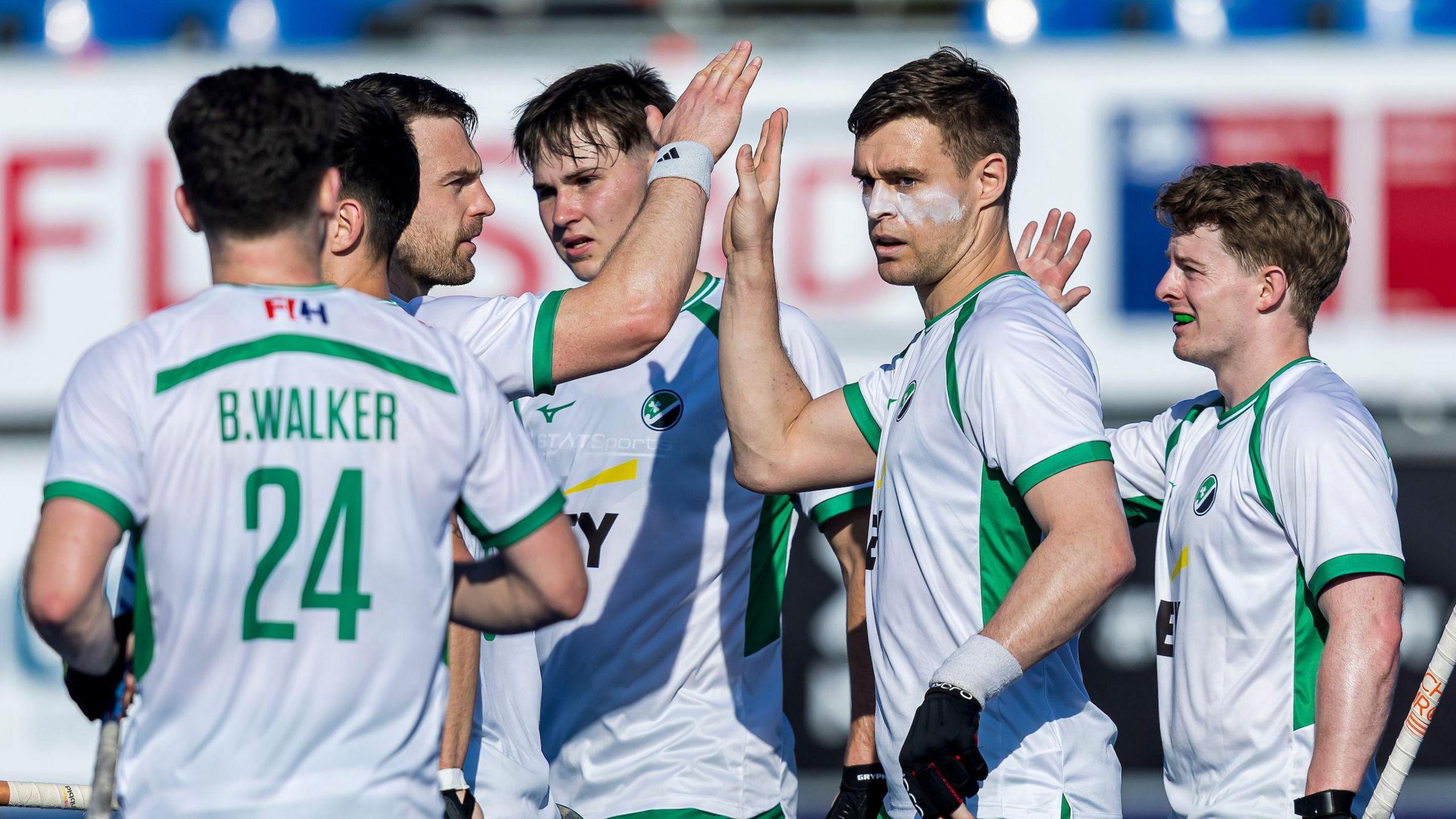 Ireland's hockey team celebrate a goal against Poland