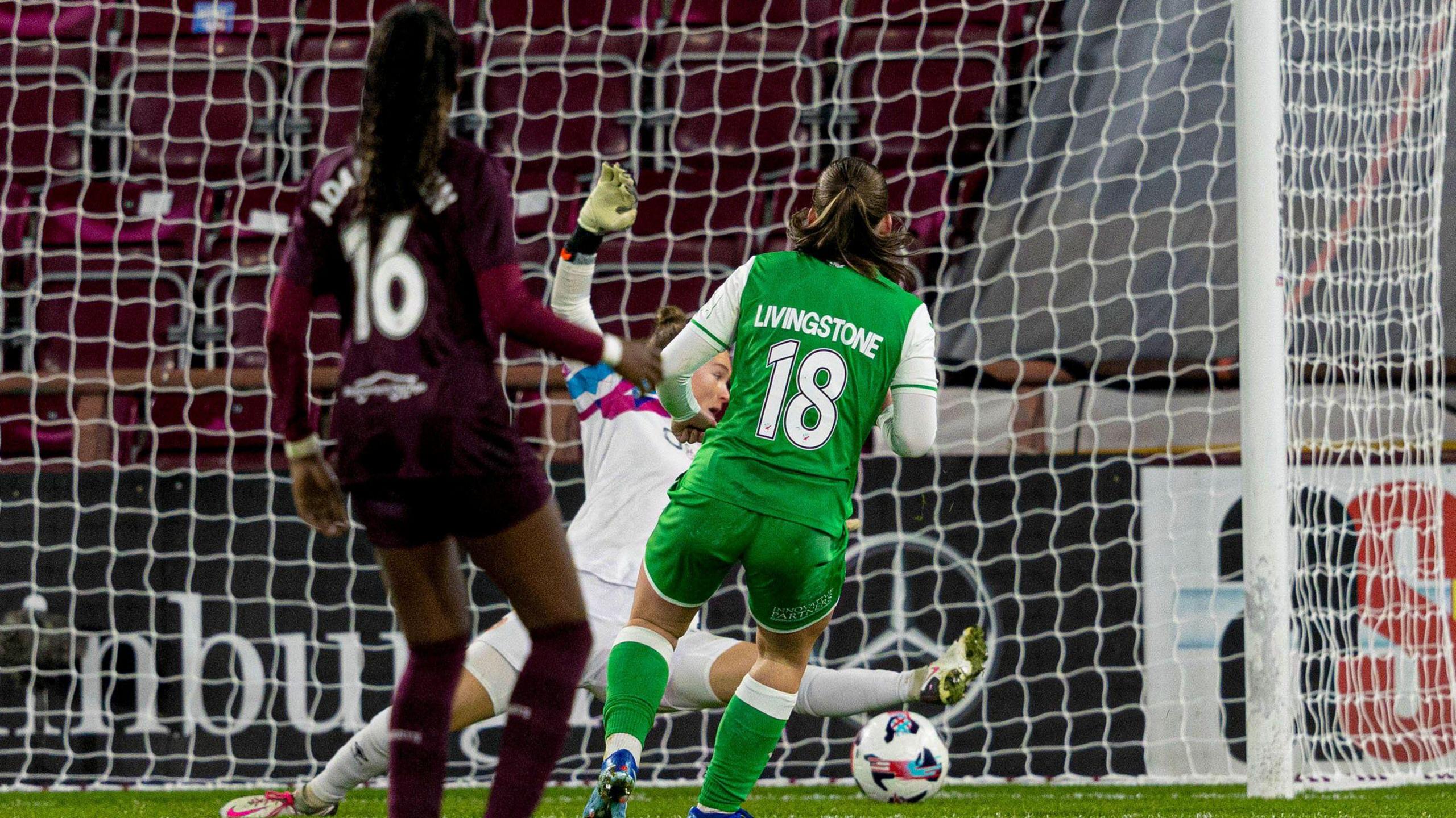 Rosie Livingston scores for Hibernian against Hearts