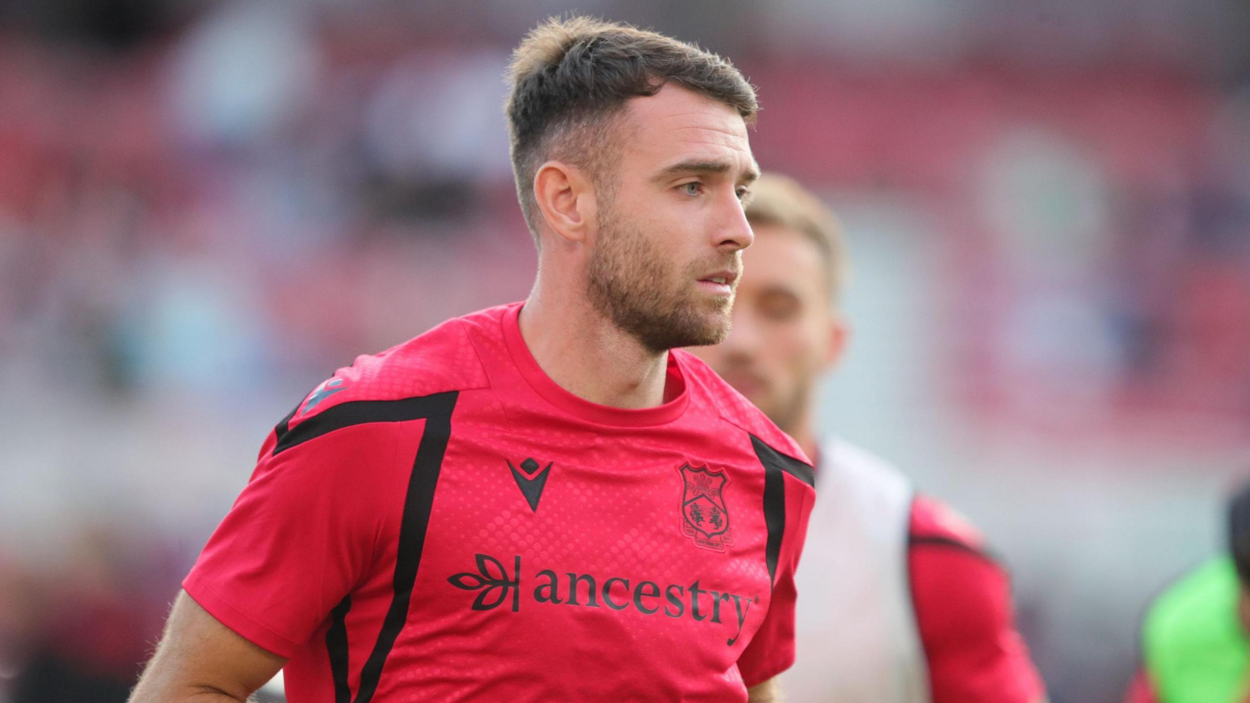 Ben Whiteman warming up for Wrexham
