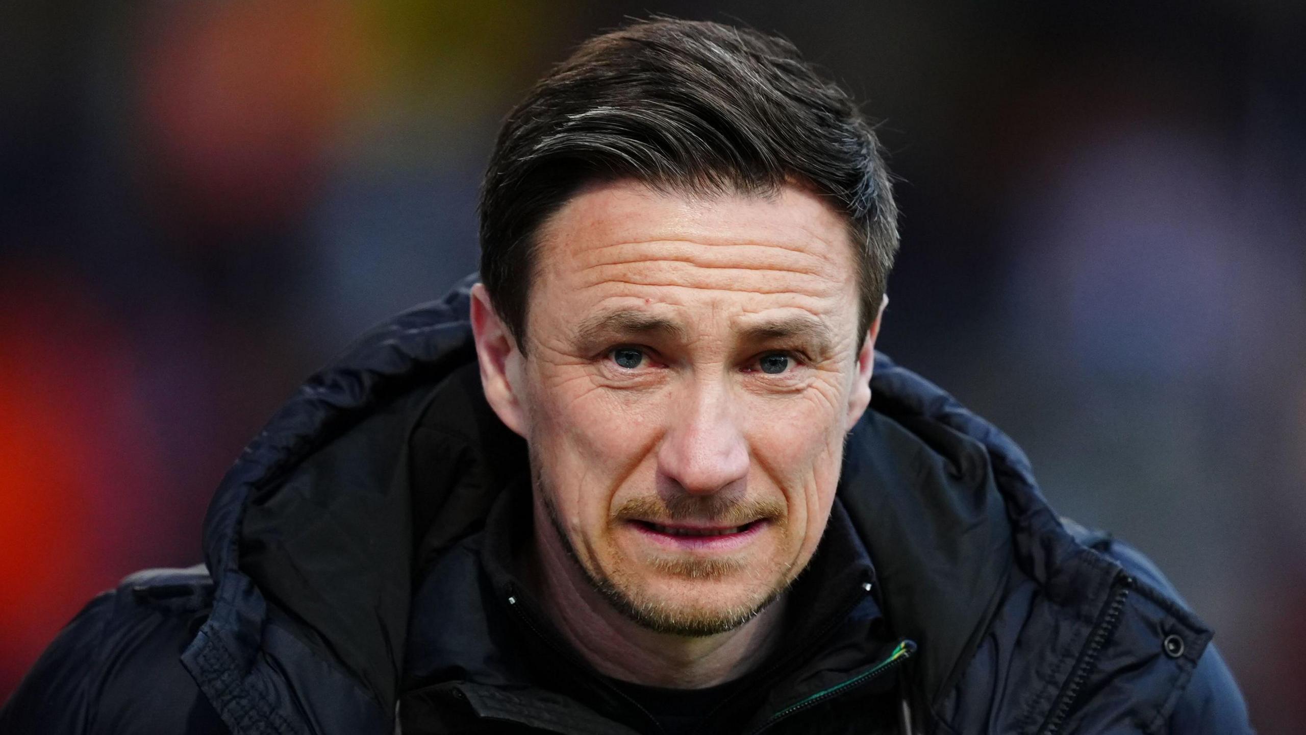 Notts County boss Stuart Maynard looks towards the camera during a match