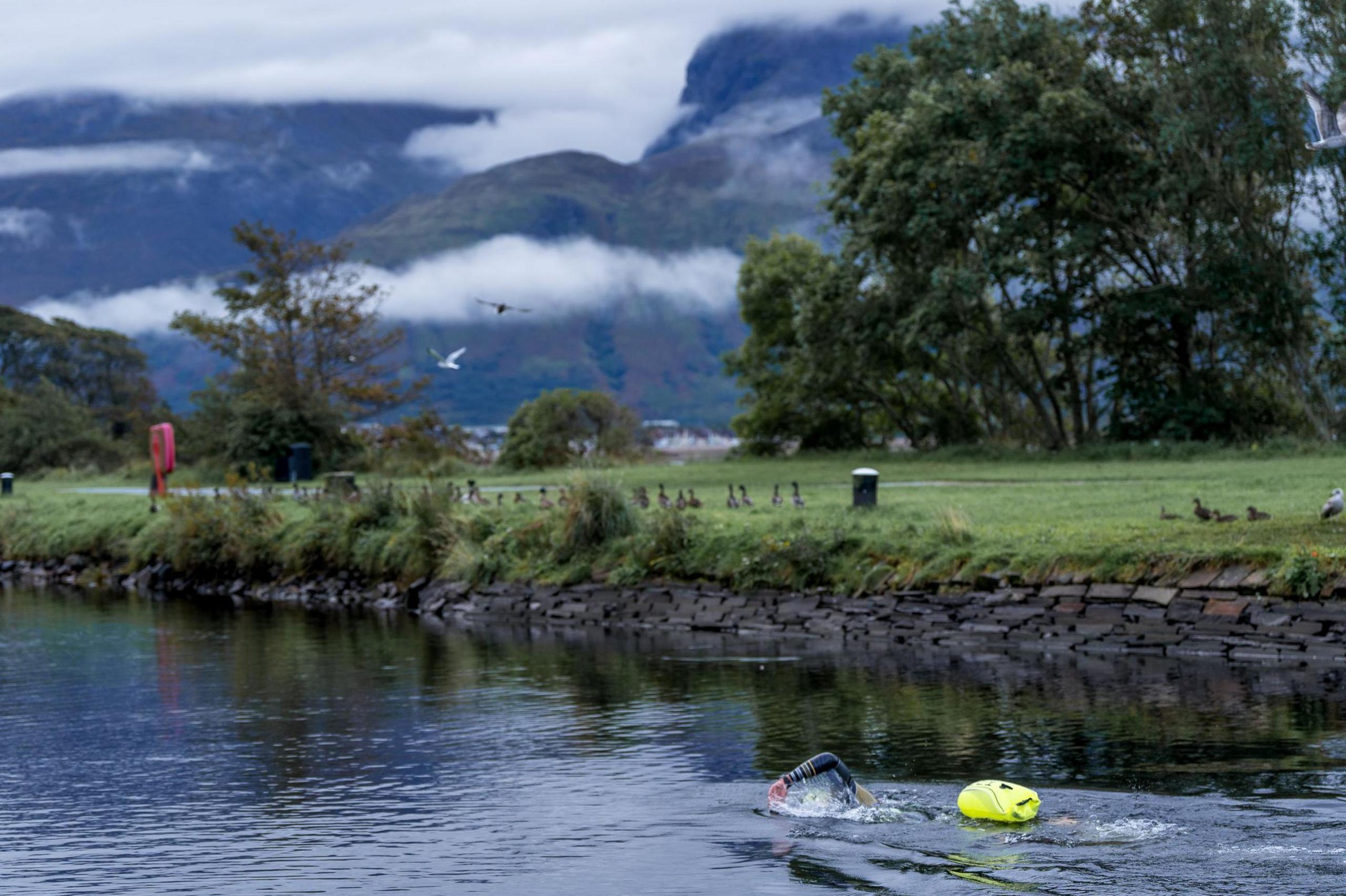 Iain swims a section of canal set in stunning mountain scenery.
