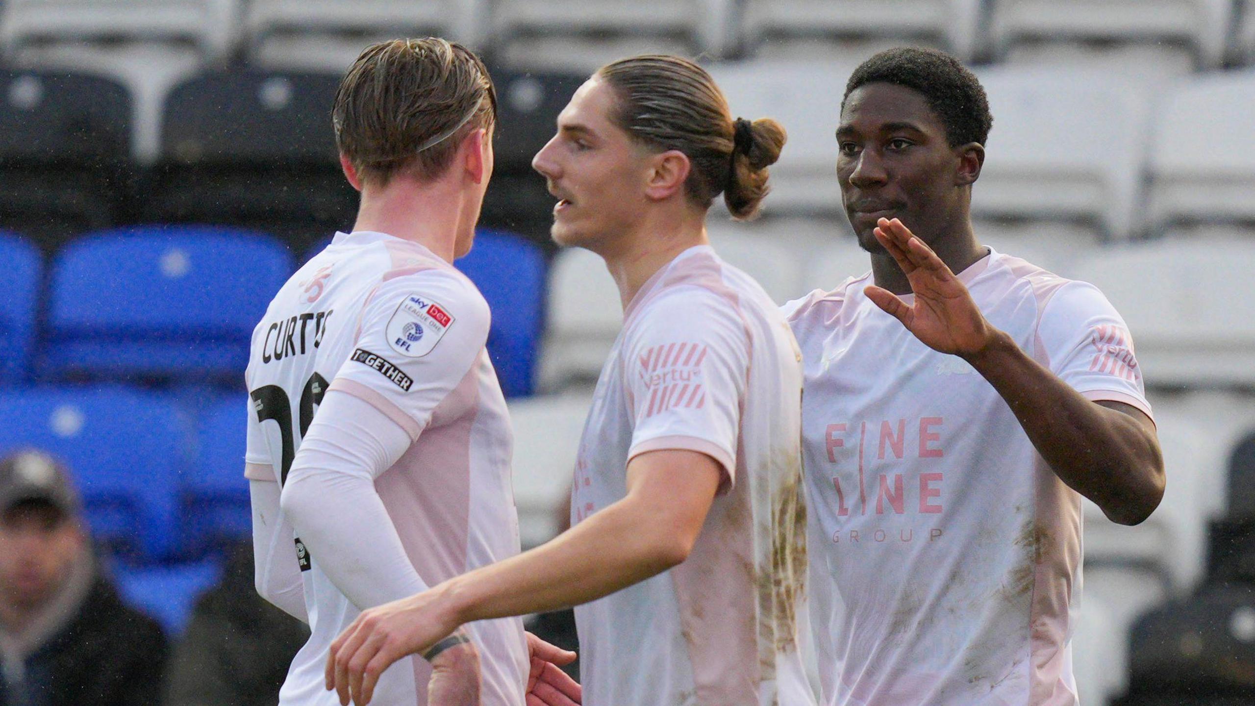 Plymouth Argyle celebrate scoring against Peterborough United