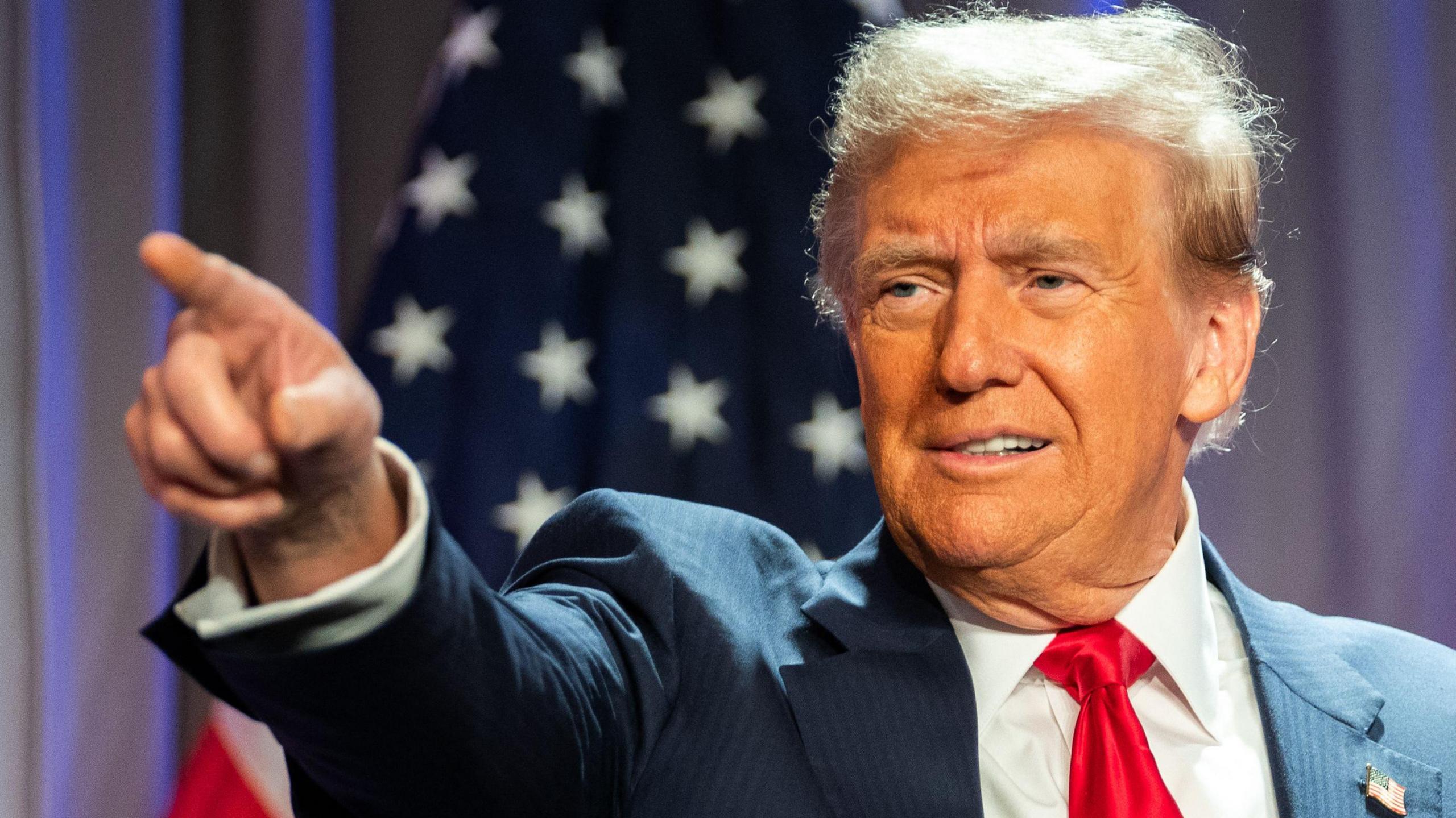 US President-elect Donald Trump gestures while speaking during a meeting with House Republicans at the Hyatt Regency hotel in Washington, DC on November 13, 2024