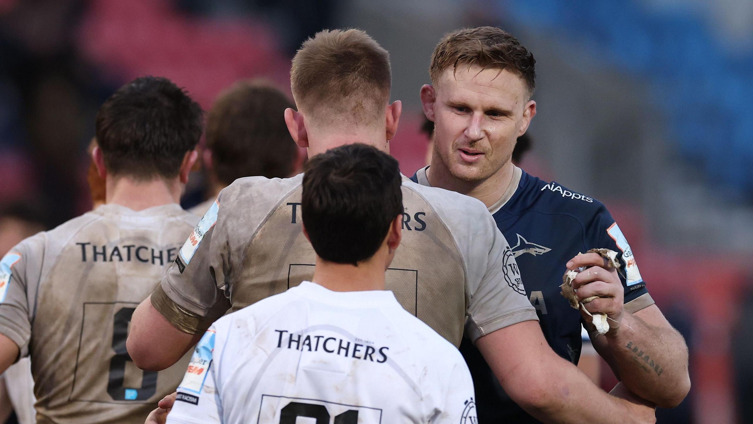 Dan du Preez (right) greets Bath's players during a game for Sale