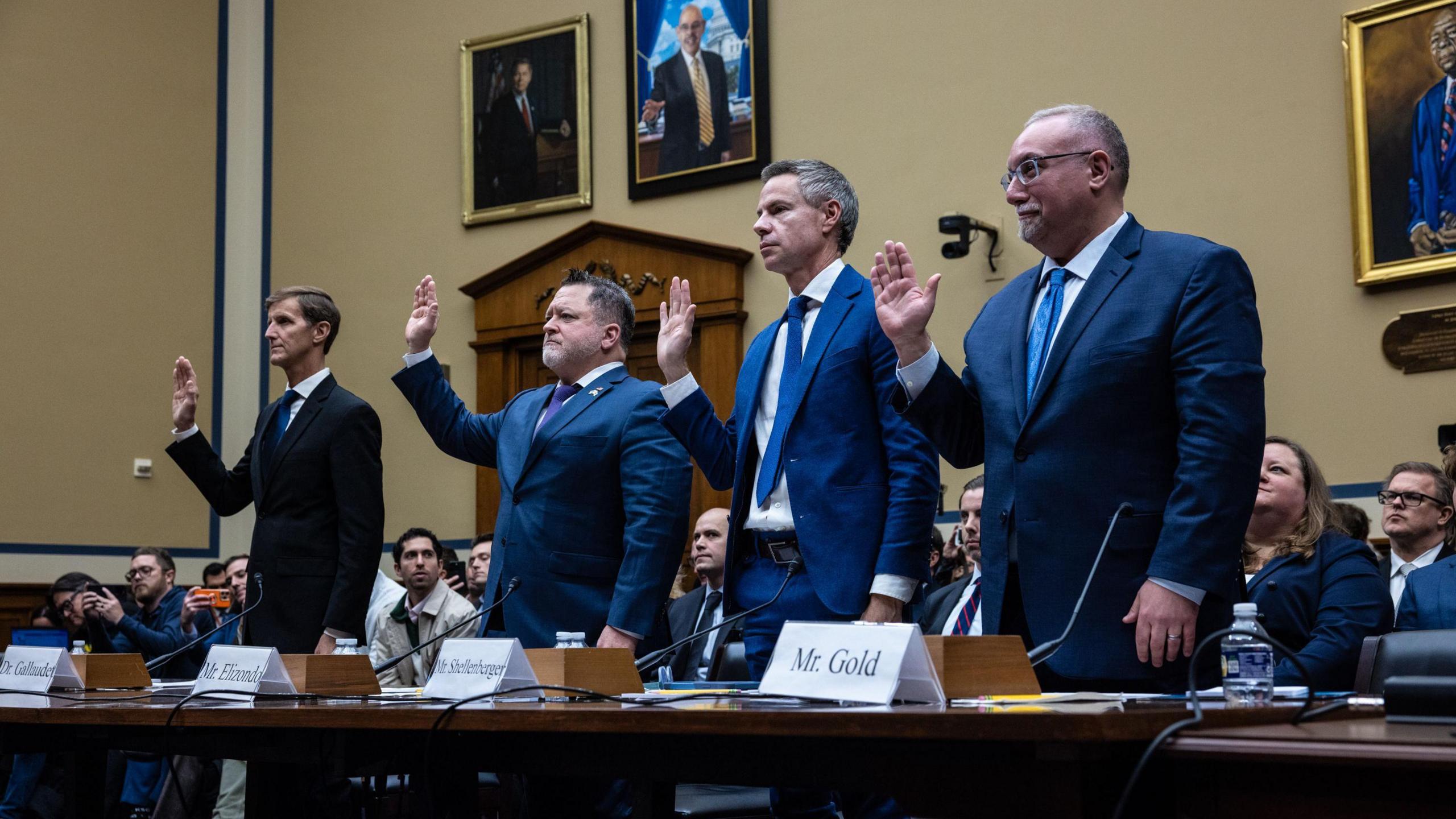 The witnesses being sworn in to testify during the hearing