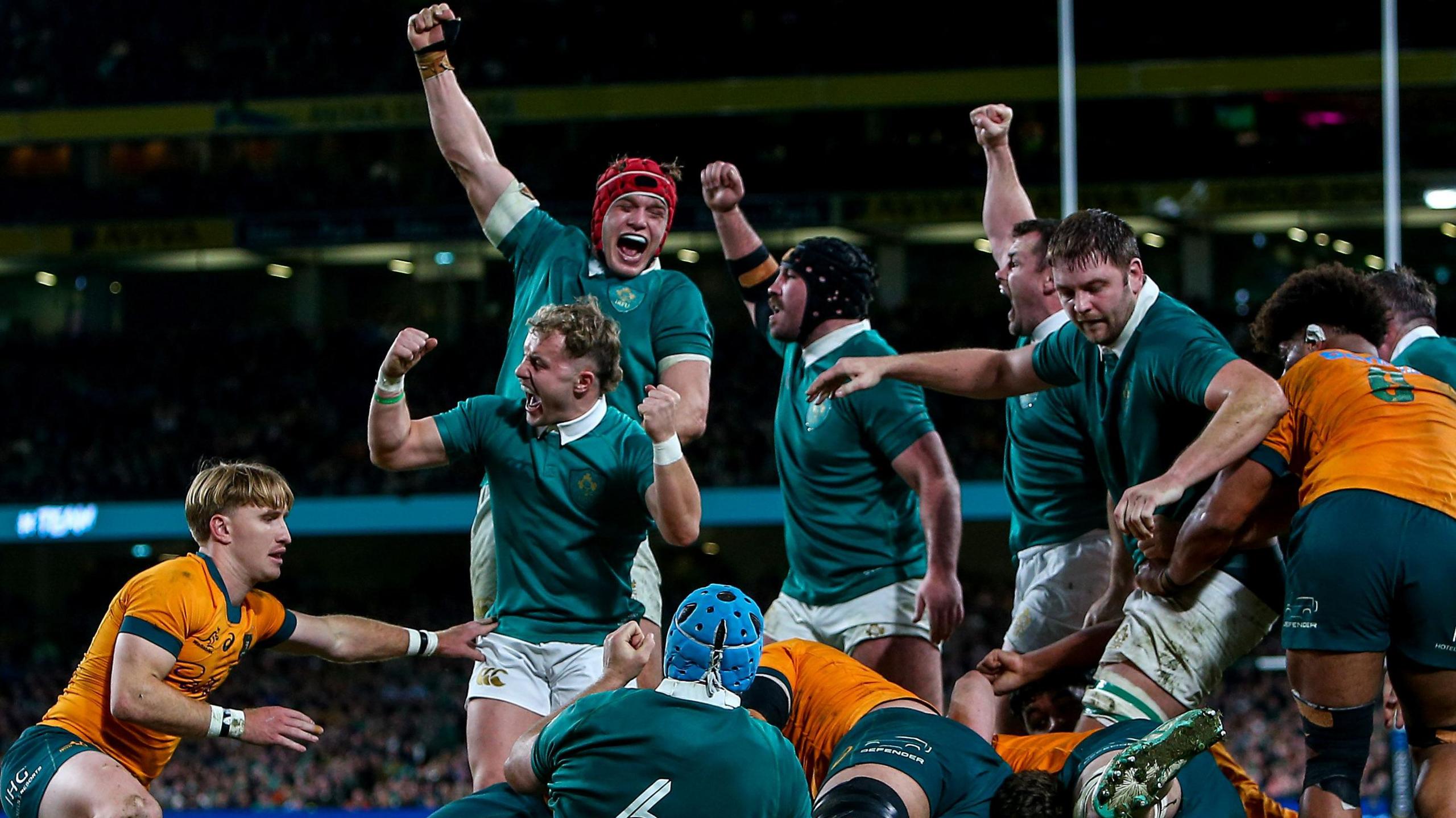 Ireland players celebrate Gus McCarthy's try