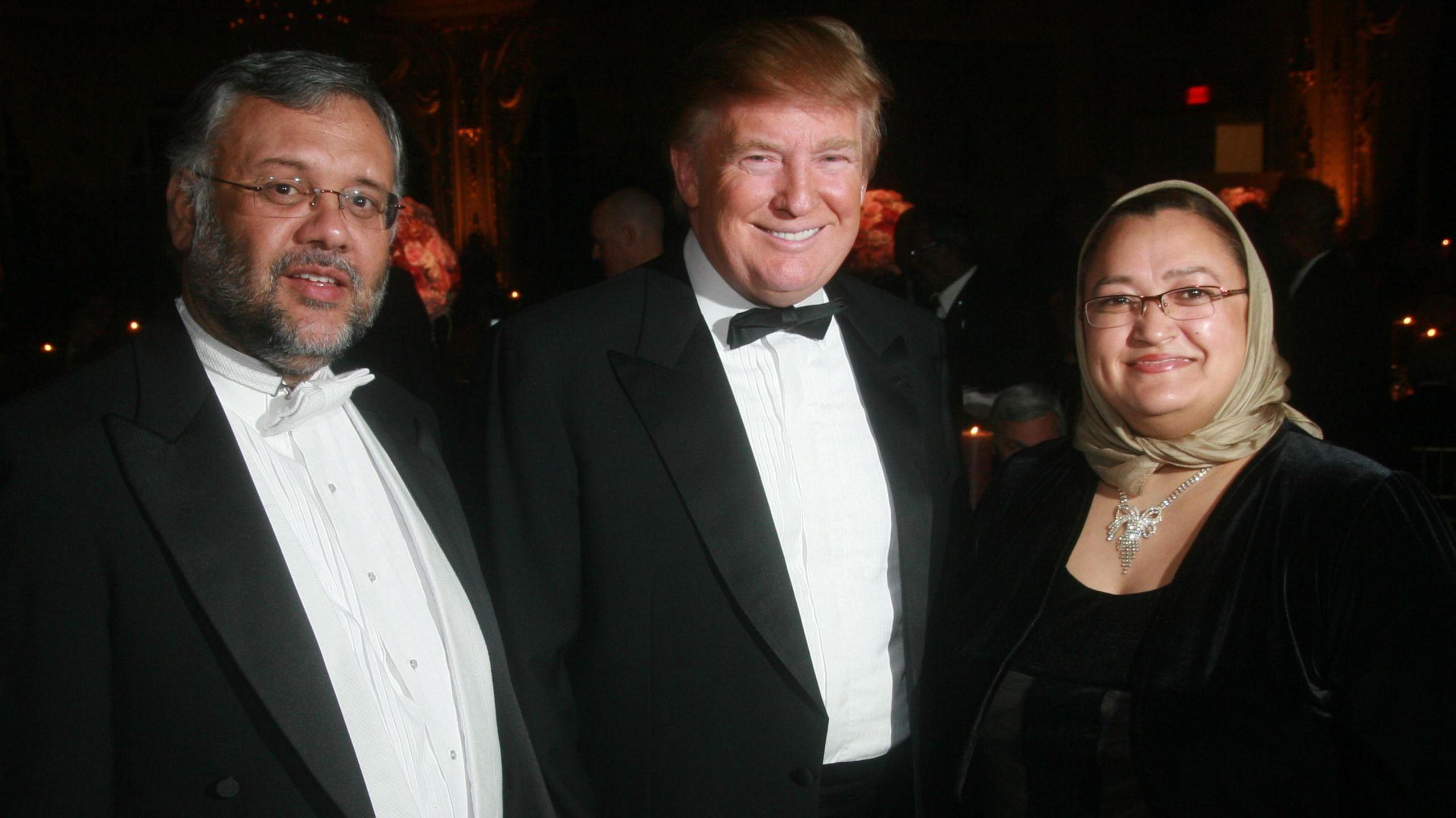 Ebrahim Rasool (left) seen with Donald Trump and Rosieda Shabodien at an  International Red Cross Ball at Mar-a-Lago in 2011