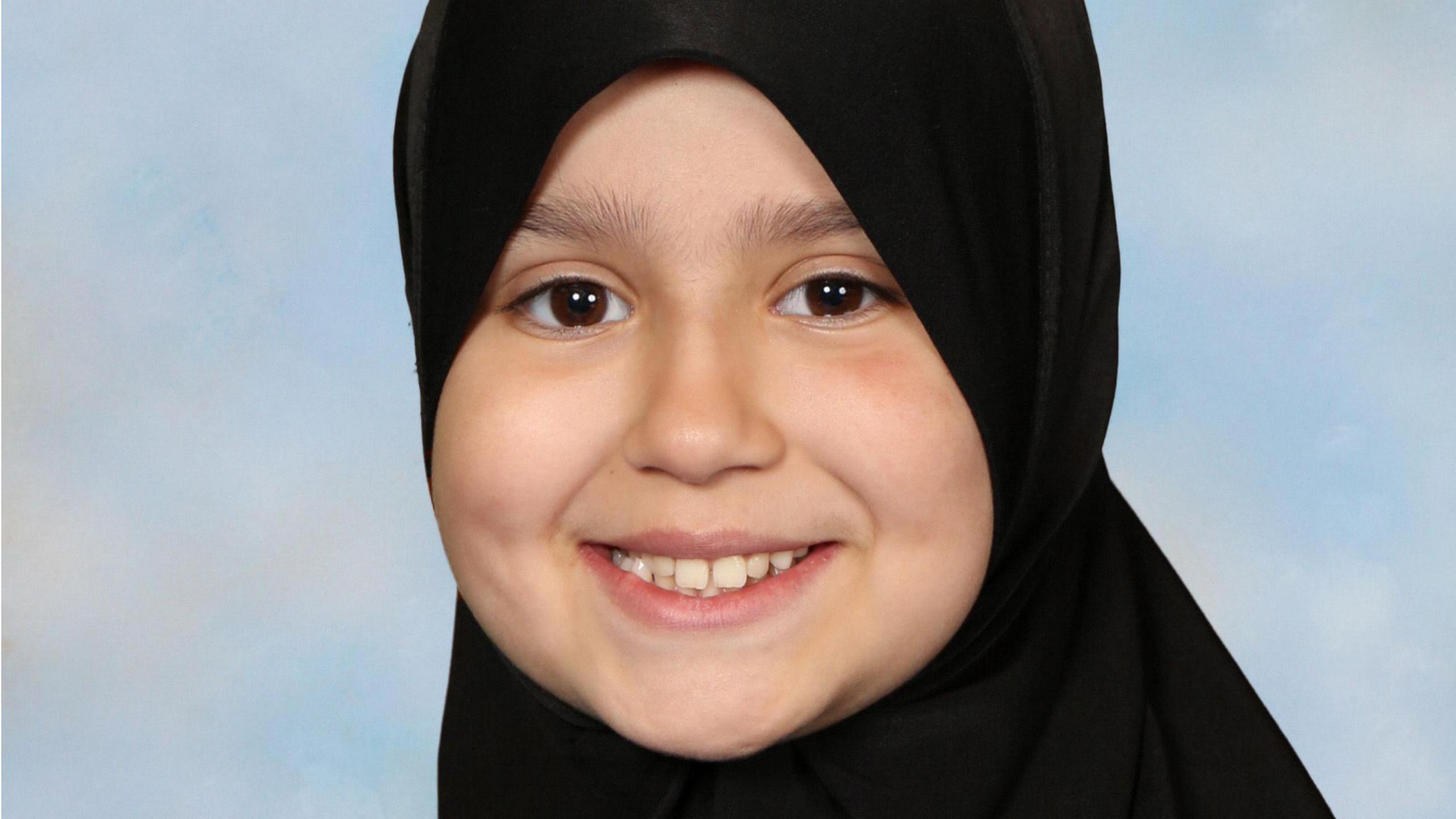 Sara Sharif smiling at the camera. She is wearing a hijab and looking directly at the camera. 