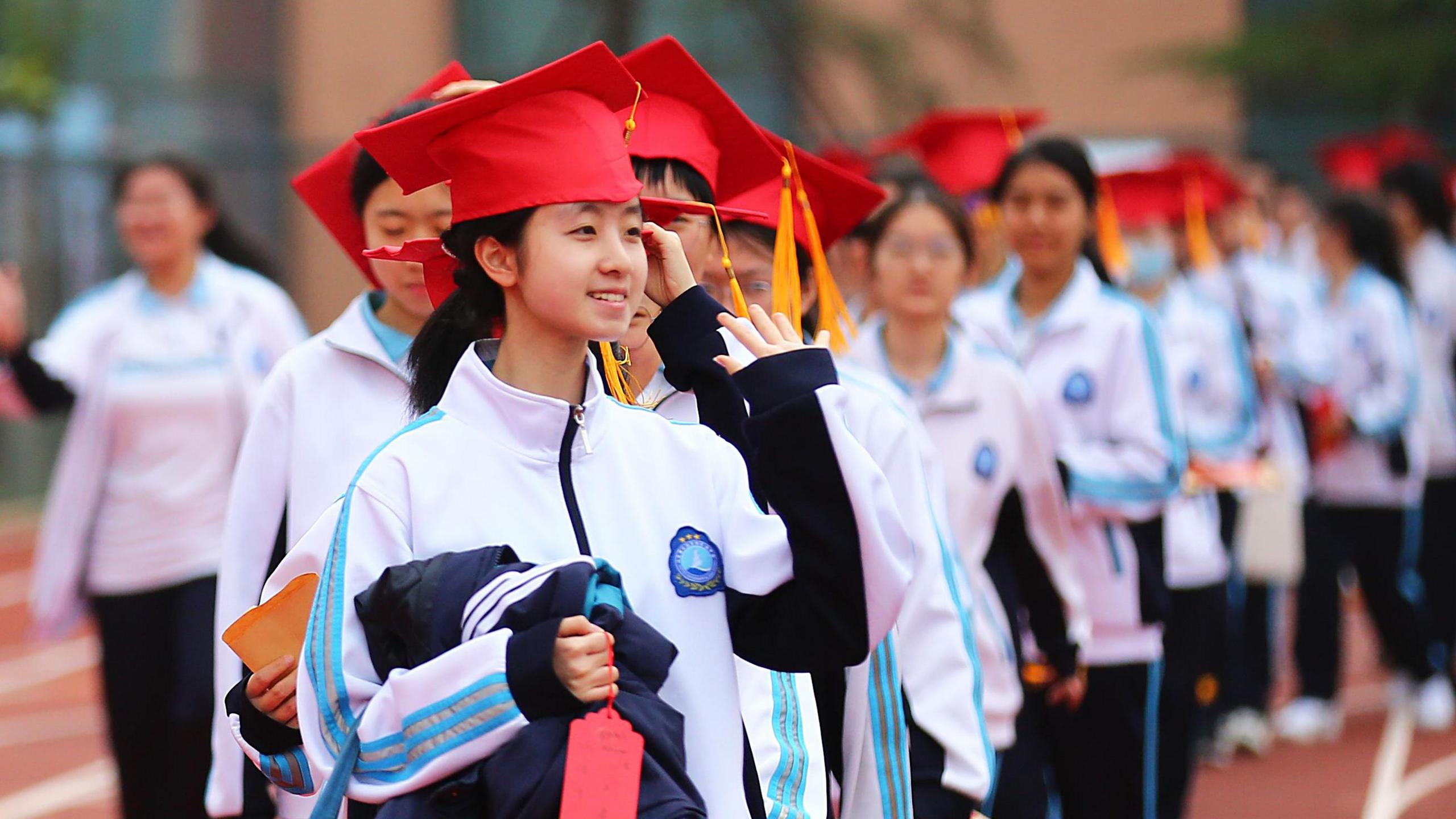 Senior three students from Rizhao Experimental High School take part in the Coming of Age ceremony & graduation ceremony on May 16, 2025 in Rizhao, Shandong Province of China.