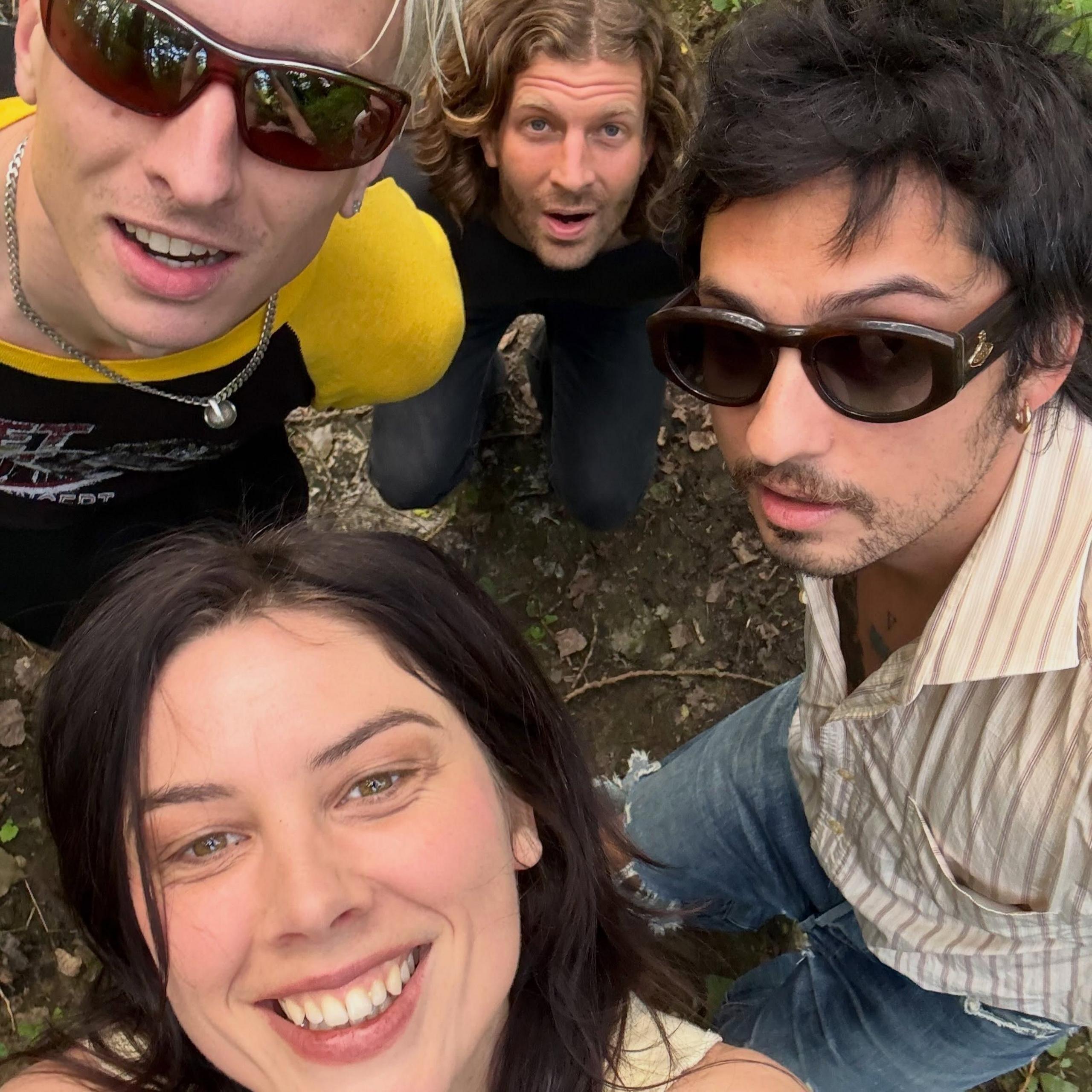 Wolf Alice pose backstage at Finsbury Park