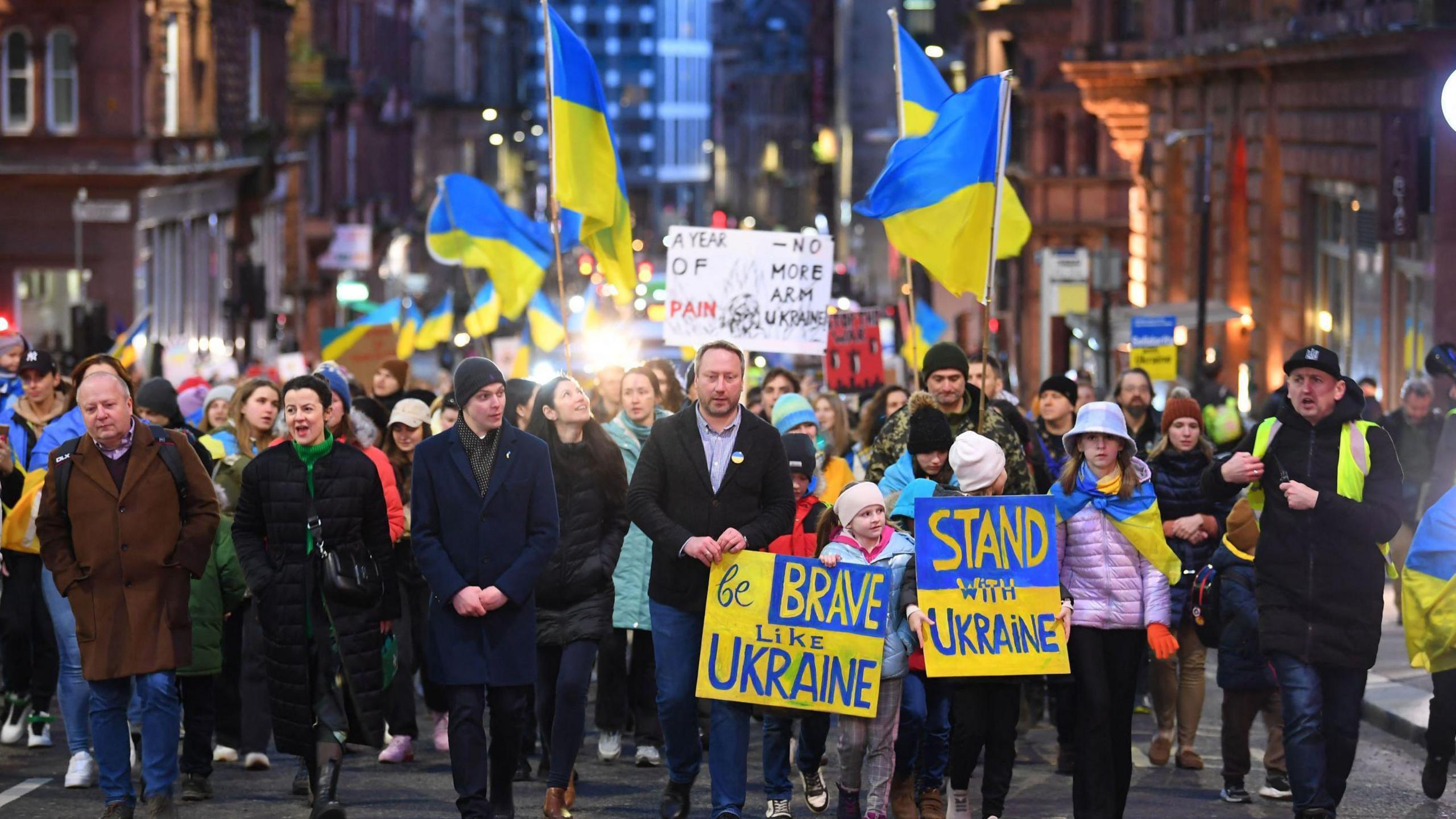 Ukrainians marching in a street in Scotland