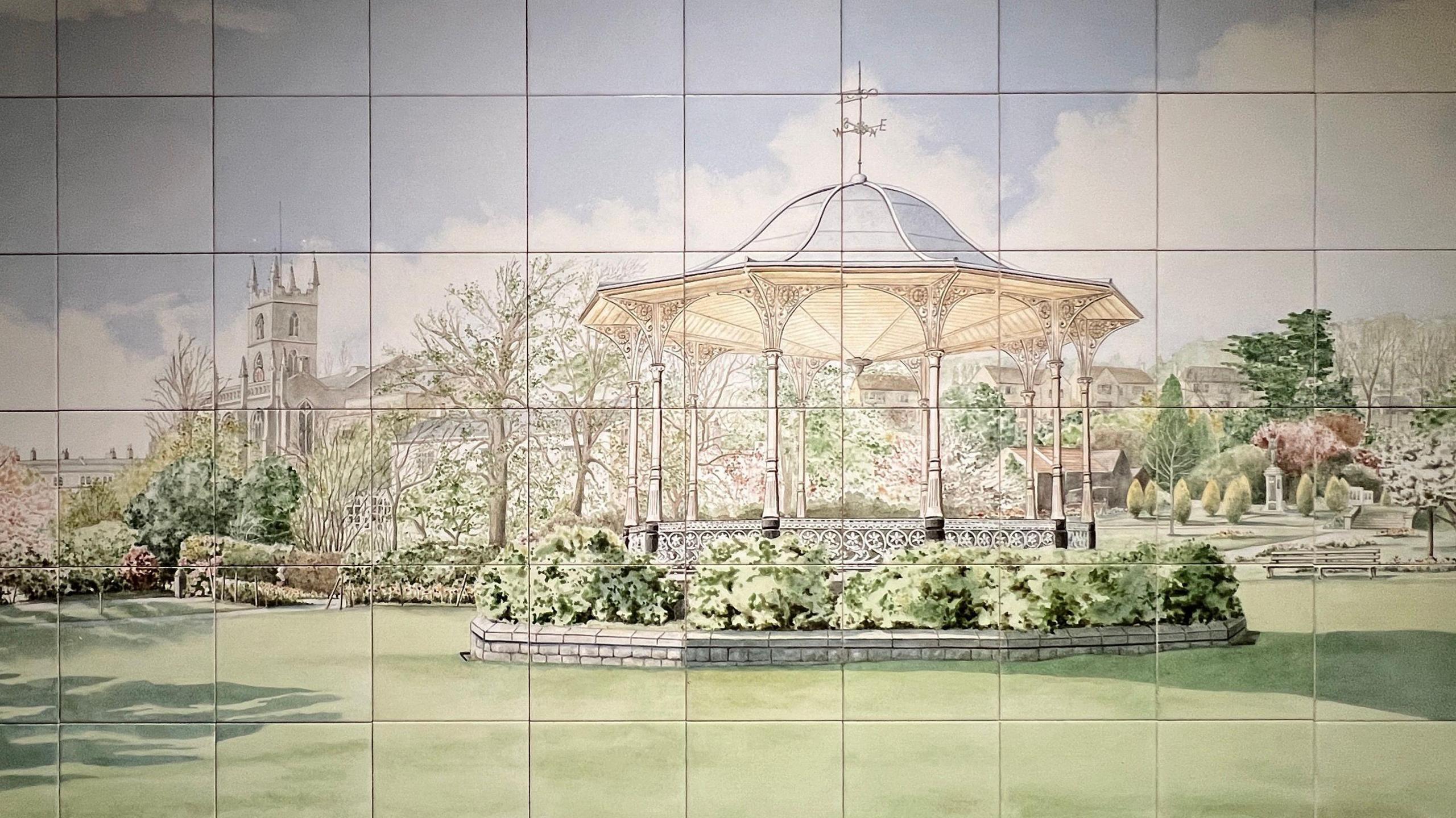 A painting on the tiles of a garden pavilion in Grove Park. There are bushes planted around the base of the structure and a small stone wall. In the background there are trees and a church spire visible. 