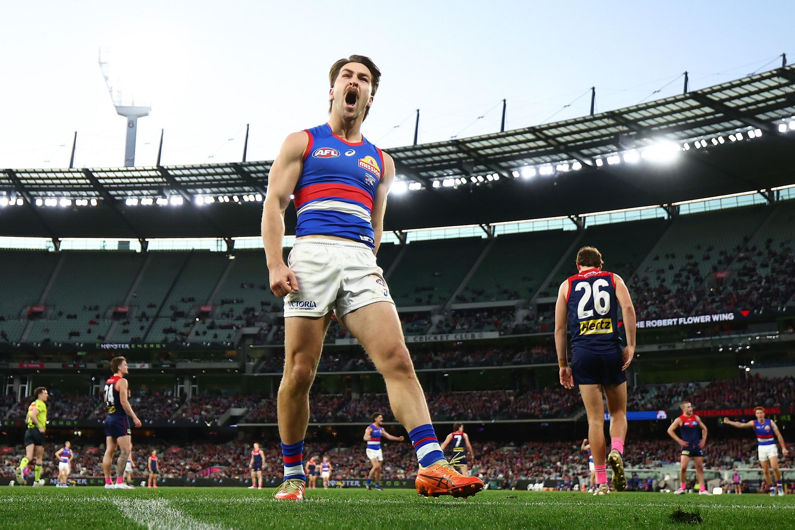 The Bulldogs' Rhylee West celebrates kicking a goal during a match between Melbourne Demons and Western Bulldogs at Melbourne Cricket Ground in Melbourne, Australia. Photo by Morgan Hancock