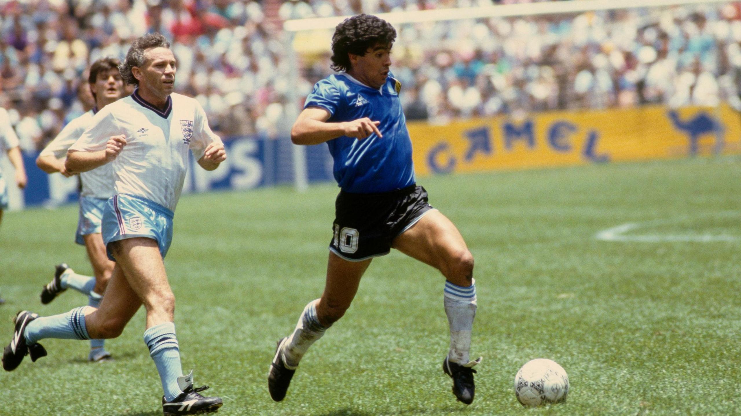 Diego Maradona running with the ball during Argentina's win against England at the 1986 World Cup