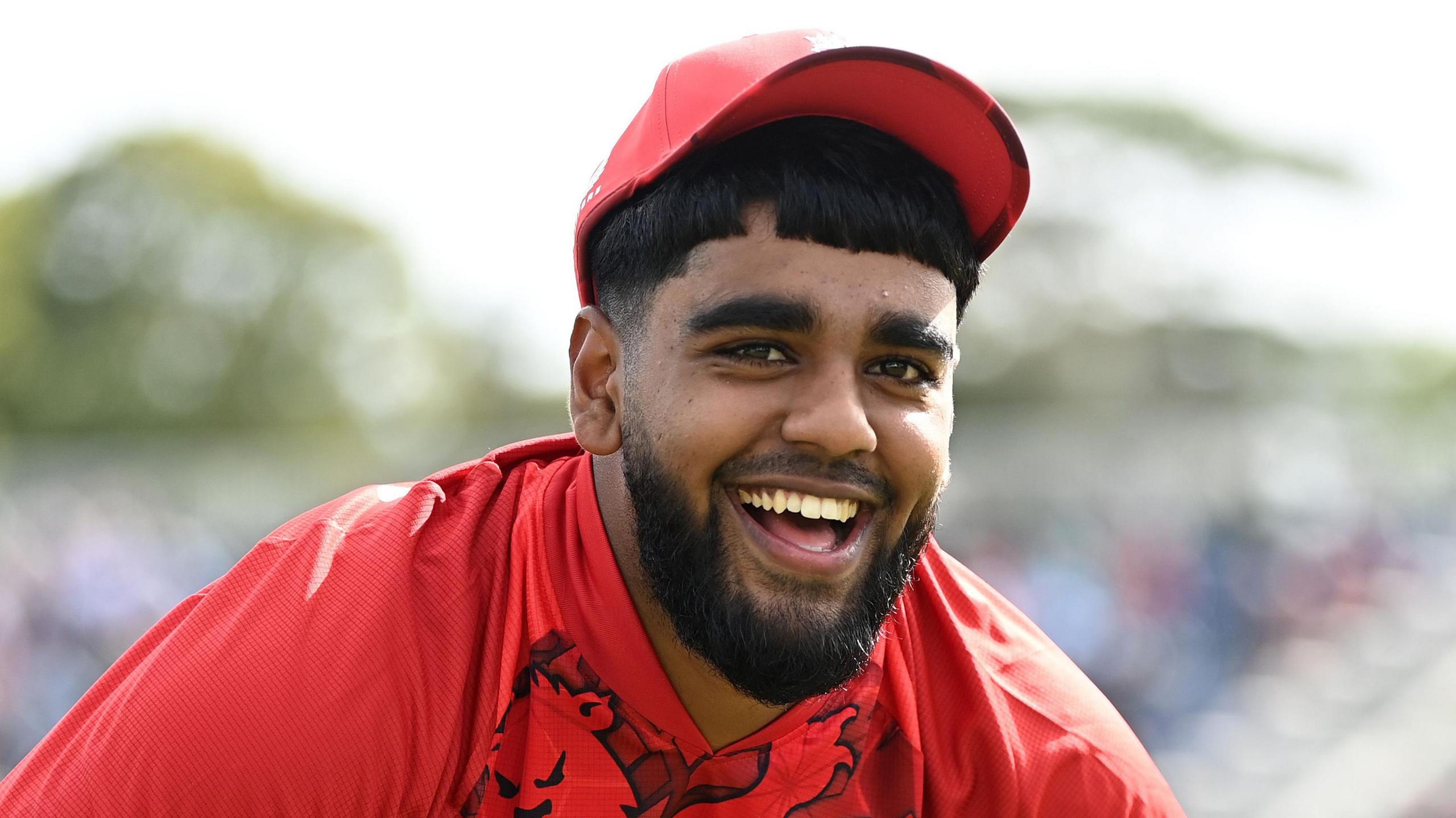 England's Rehan Ahmed smiles during a T20 international