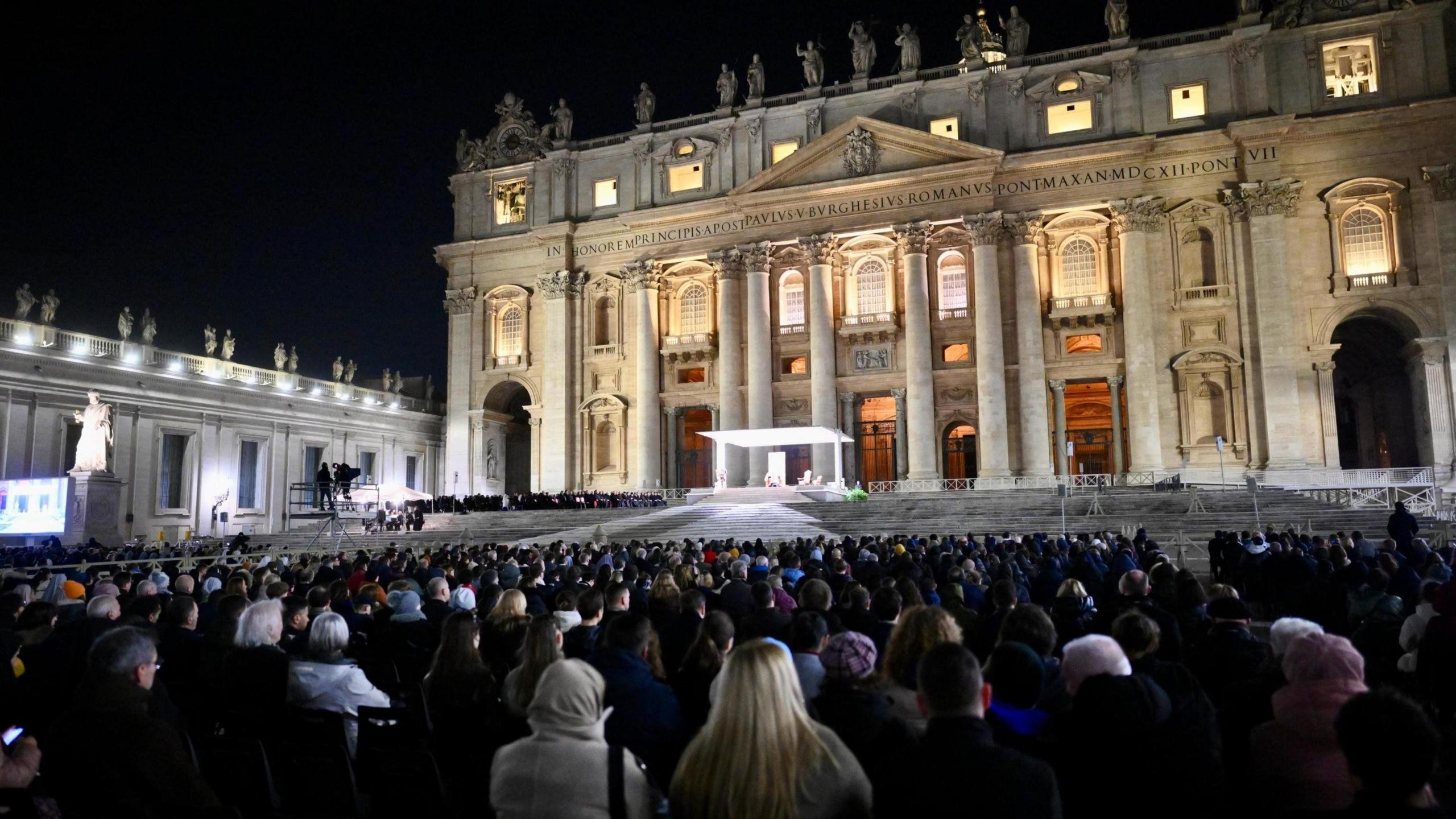 Faithful attend a Rosary prayer for the health of Pope Francis who is hospitalized with pneumonia, in St. Peter's Square, Vatican City, 26 February 2025.