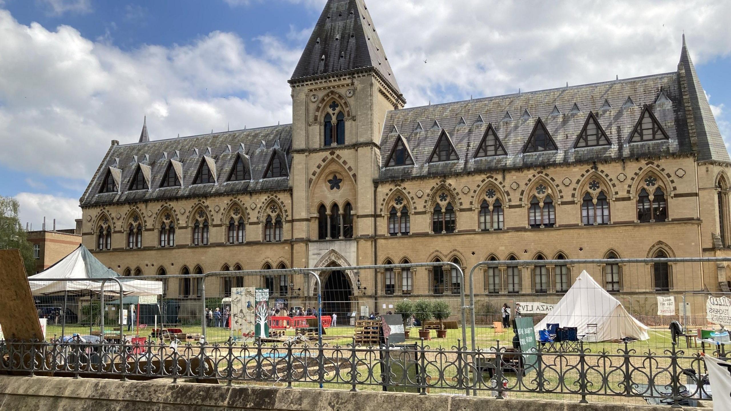 Fenced-in encampment outside Natural History Museum