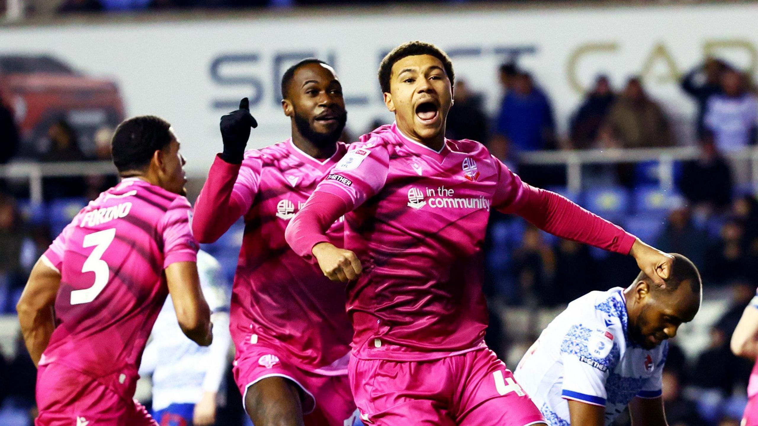 Mason Burstow celebrates after scoring a late equaliser for Bolton Wanderers at Reading