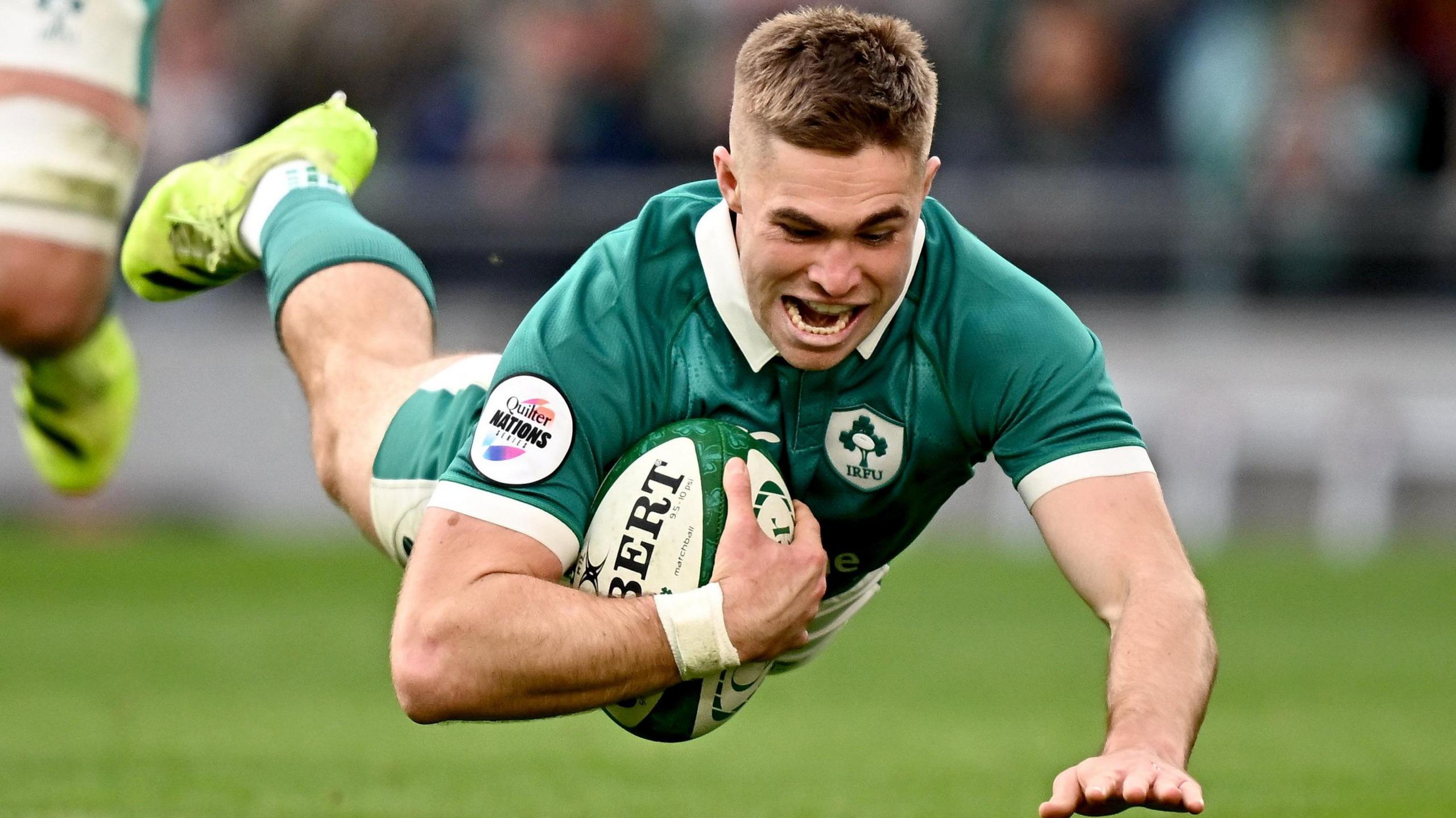 Jack Crowley dives over for a try