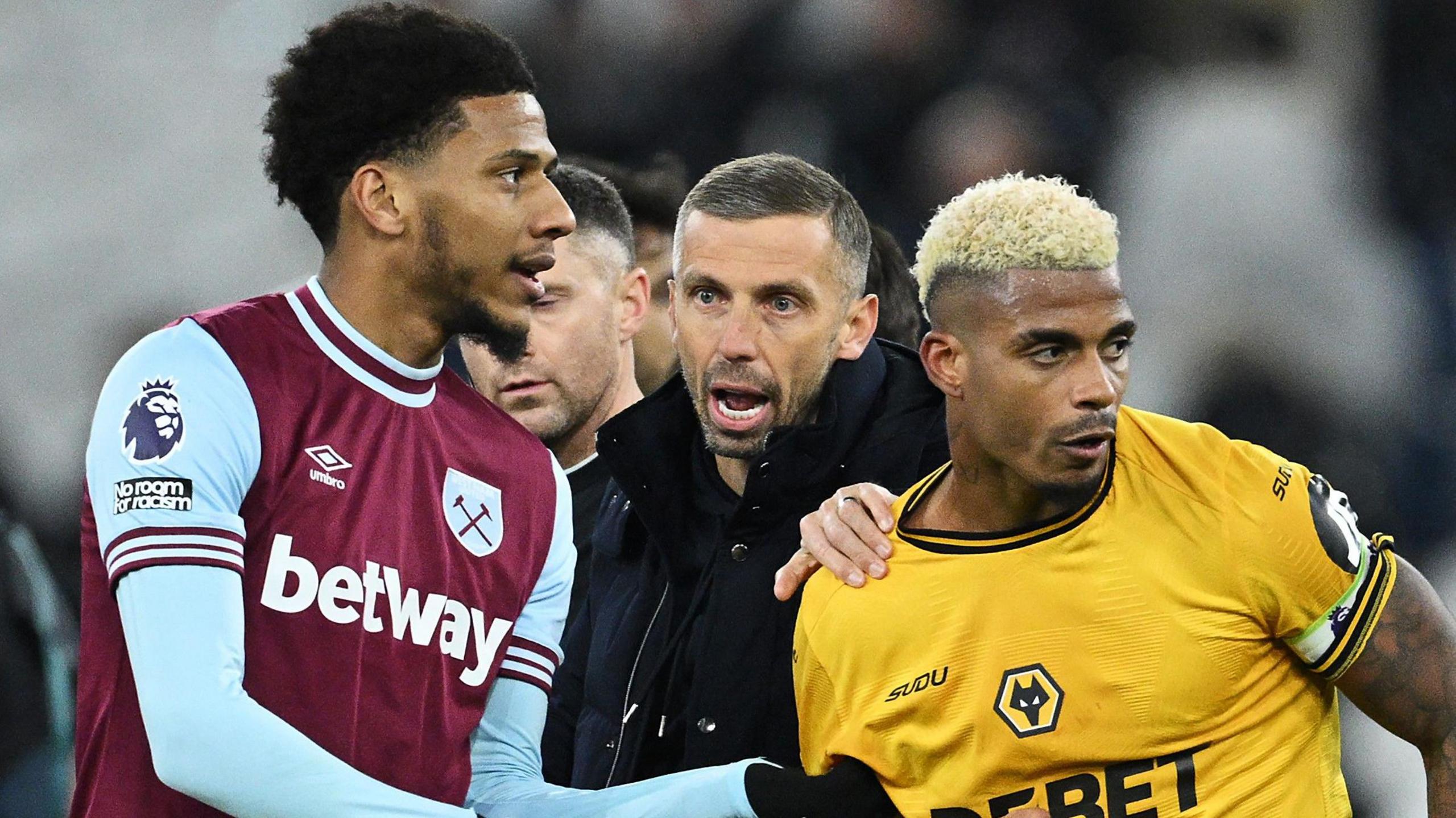 Mario Lemina is held back by boss Gary O'Neil after the defeat at West Ham.