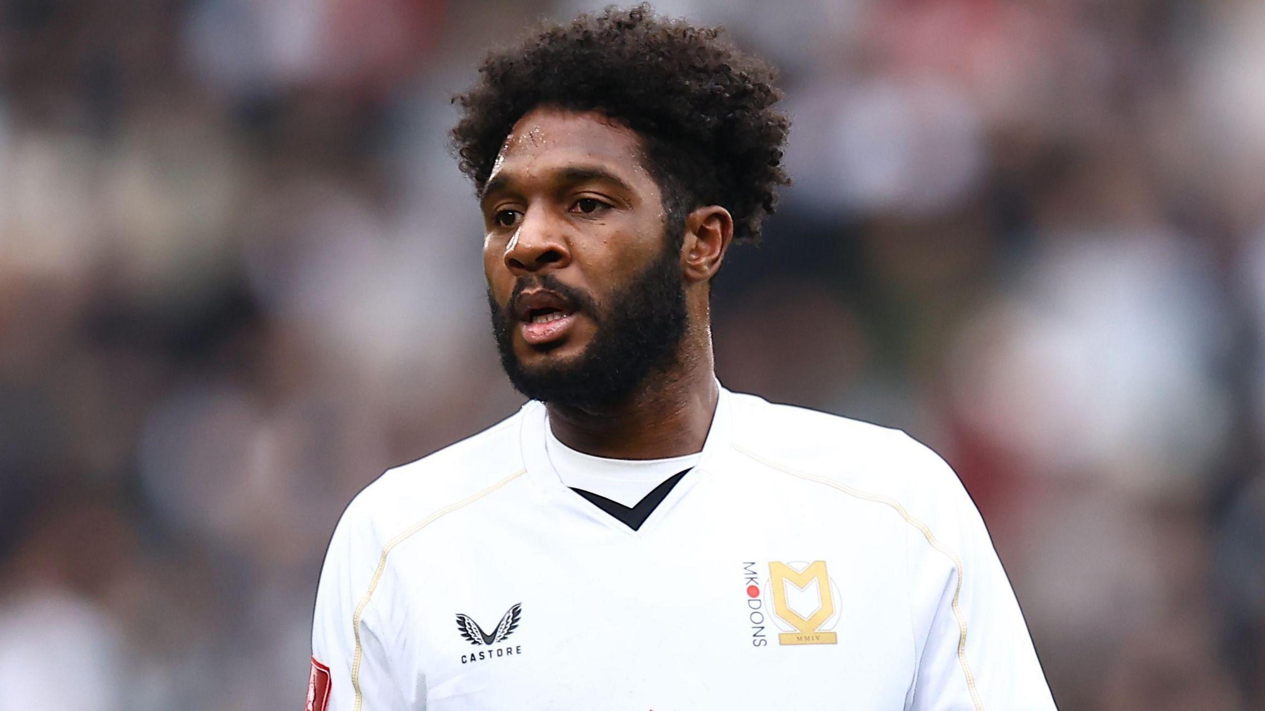 MK Dons striker Ellis Harrison