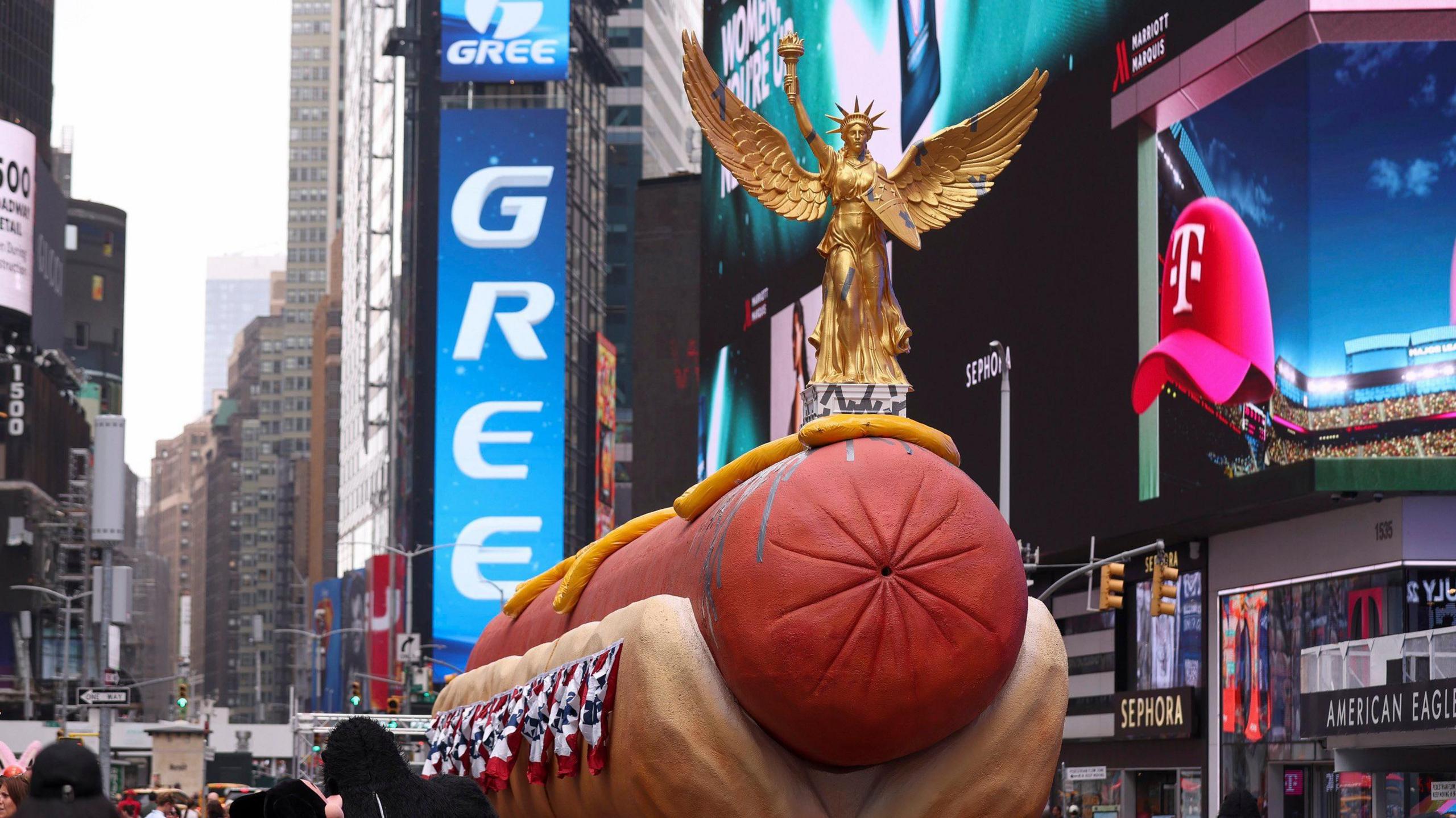Giant hot dog sculpture in Times Square.