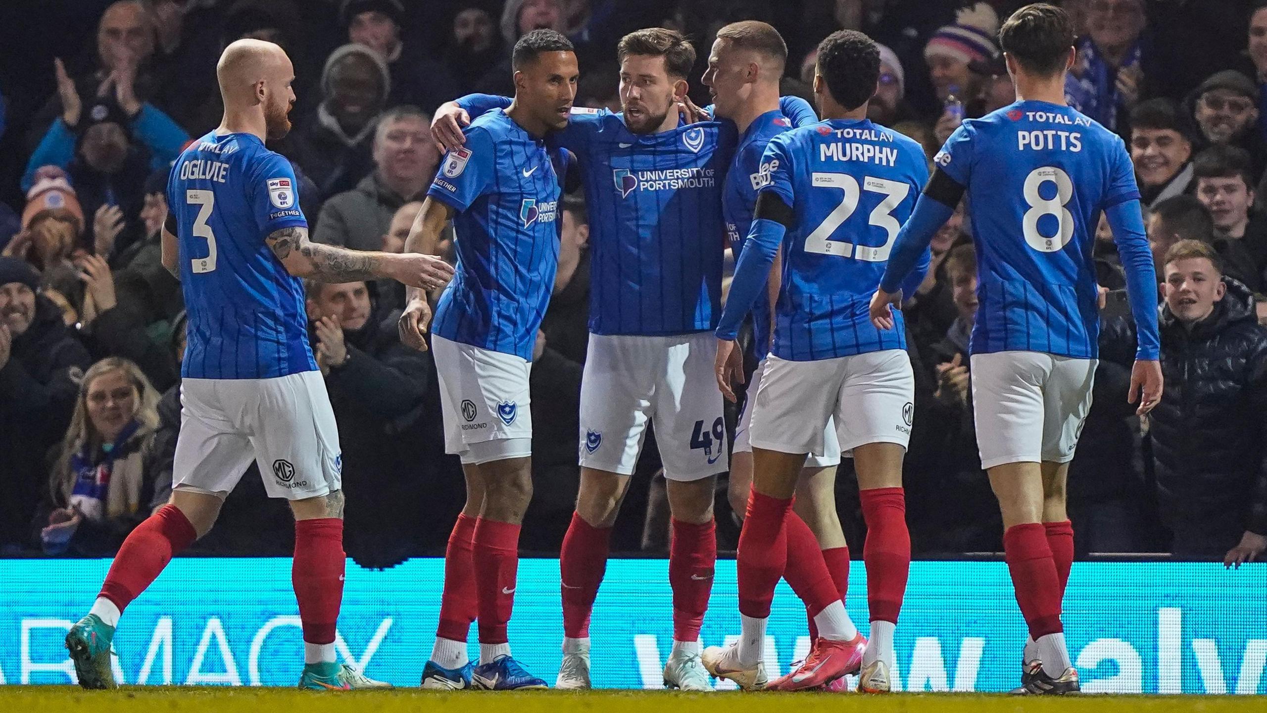 Portsmouth players celebrate the second goal in the 3-1 over Stoke at Fratton Park