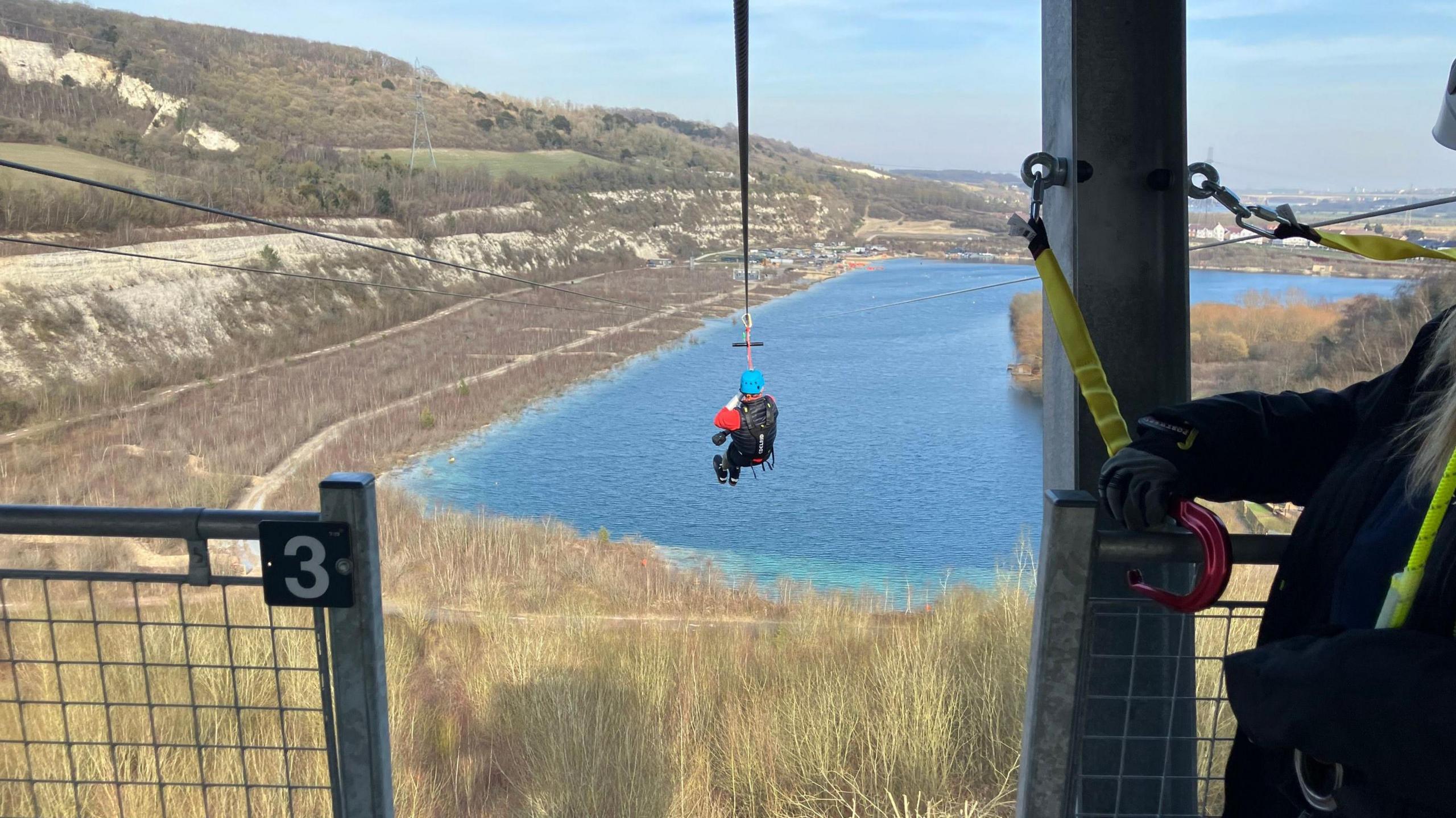 Lord Mackinlay of Richborough on the zip wire above a lake