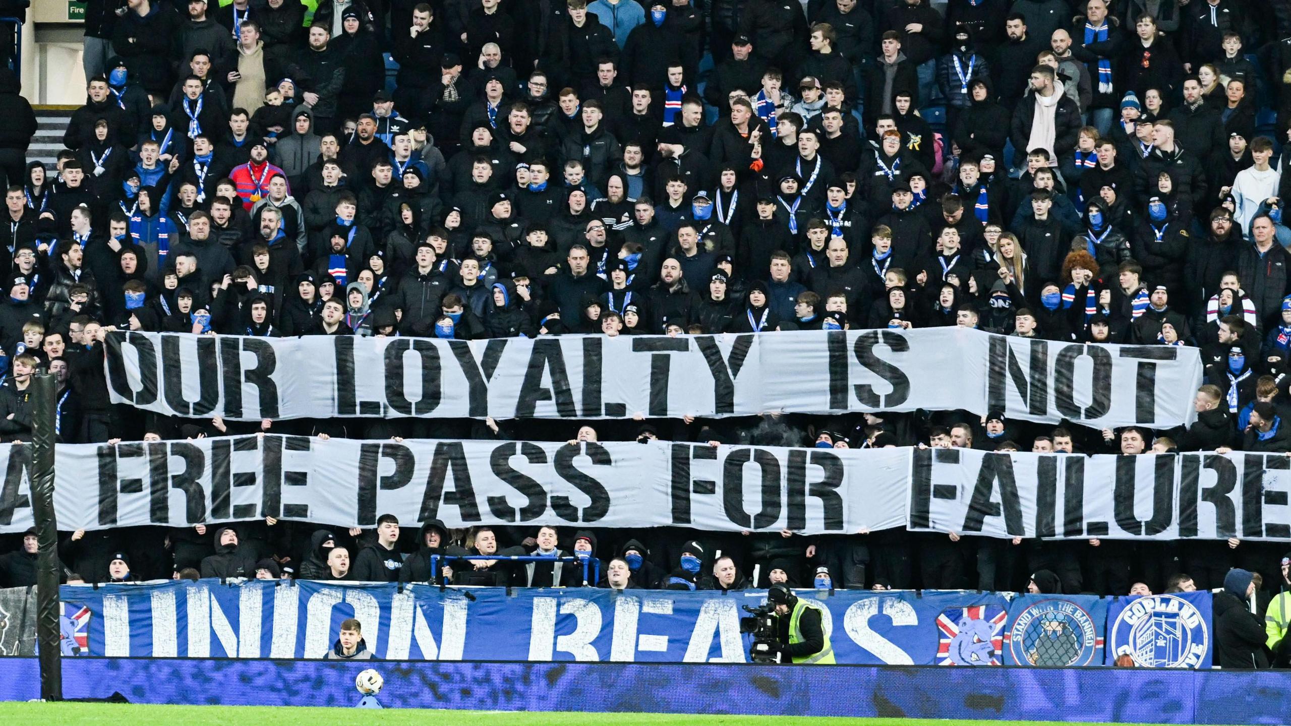 Rangers fans with a banner at the game against St Johnstone