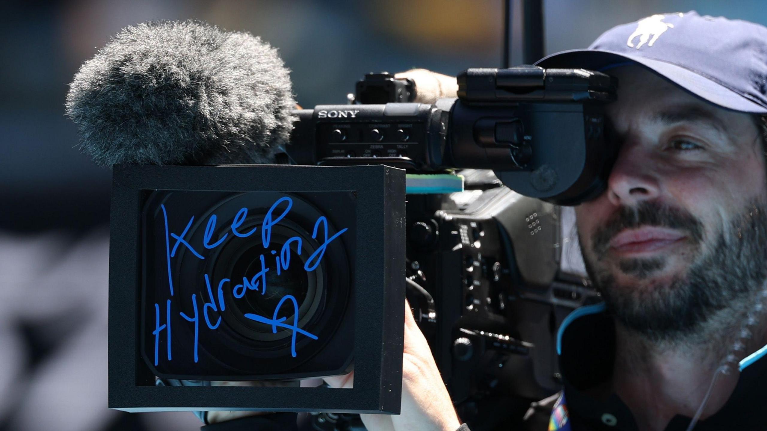 The camera lens signed by Amanda Anisimova