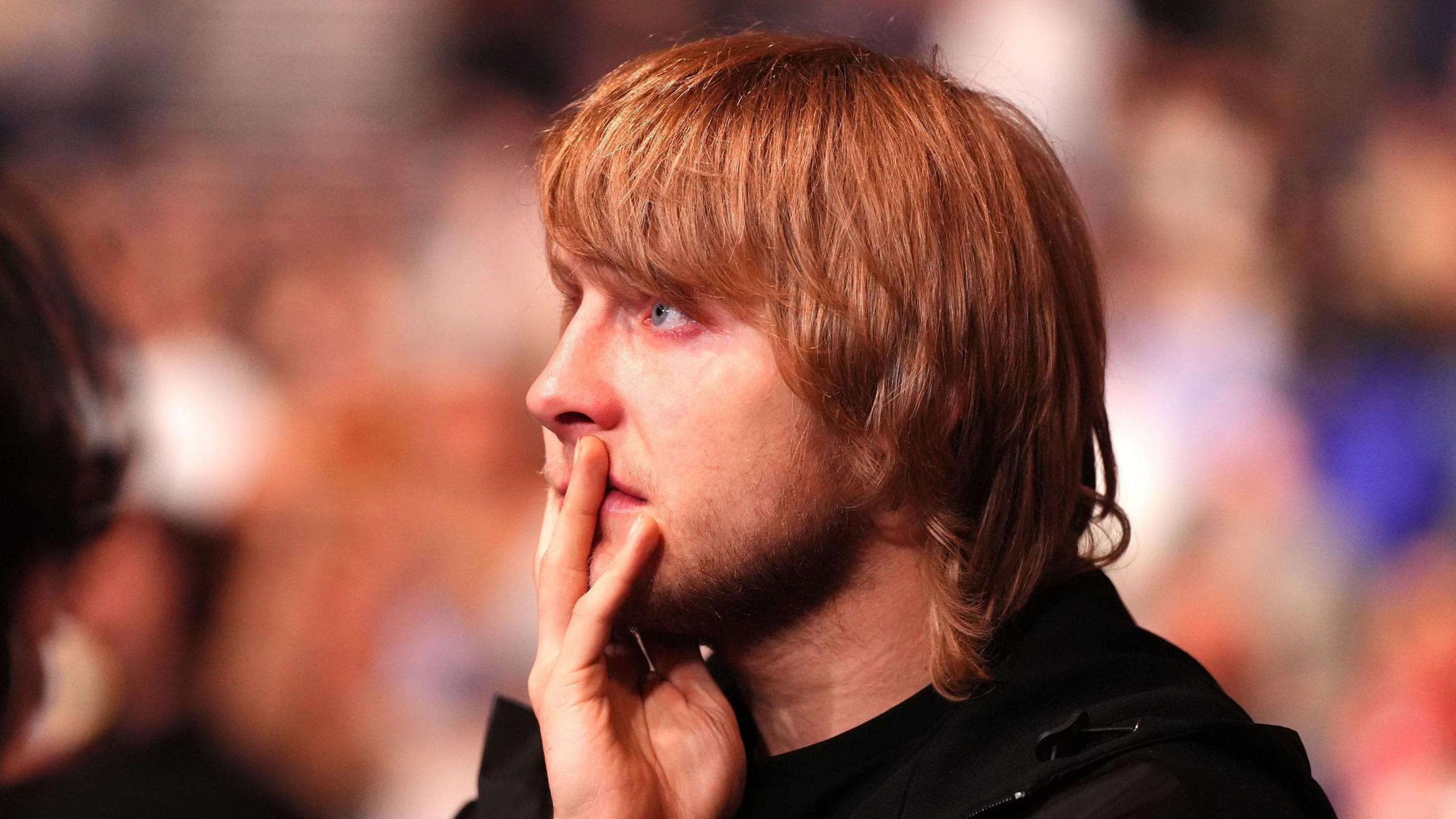 Paddy Pimblett looks on emotional at cageside