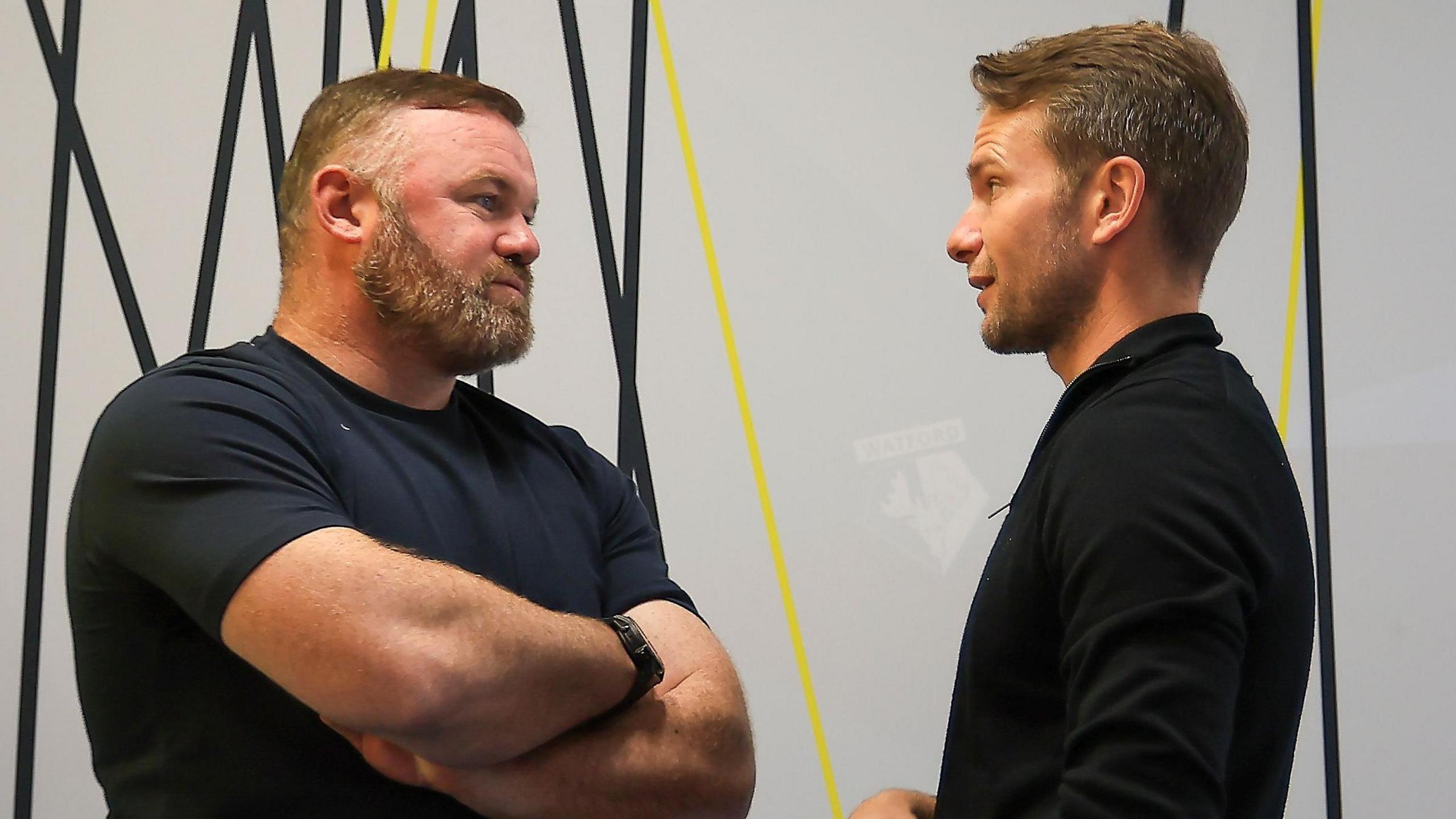 Wayne Rooney (left) chats with Tom Cleverley