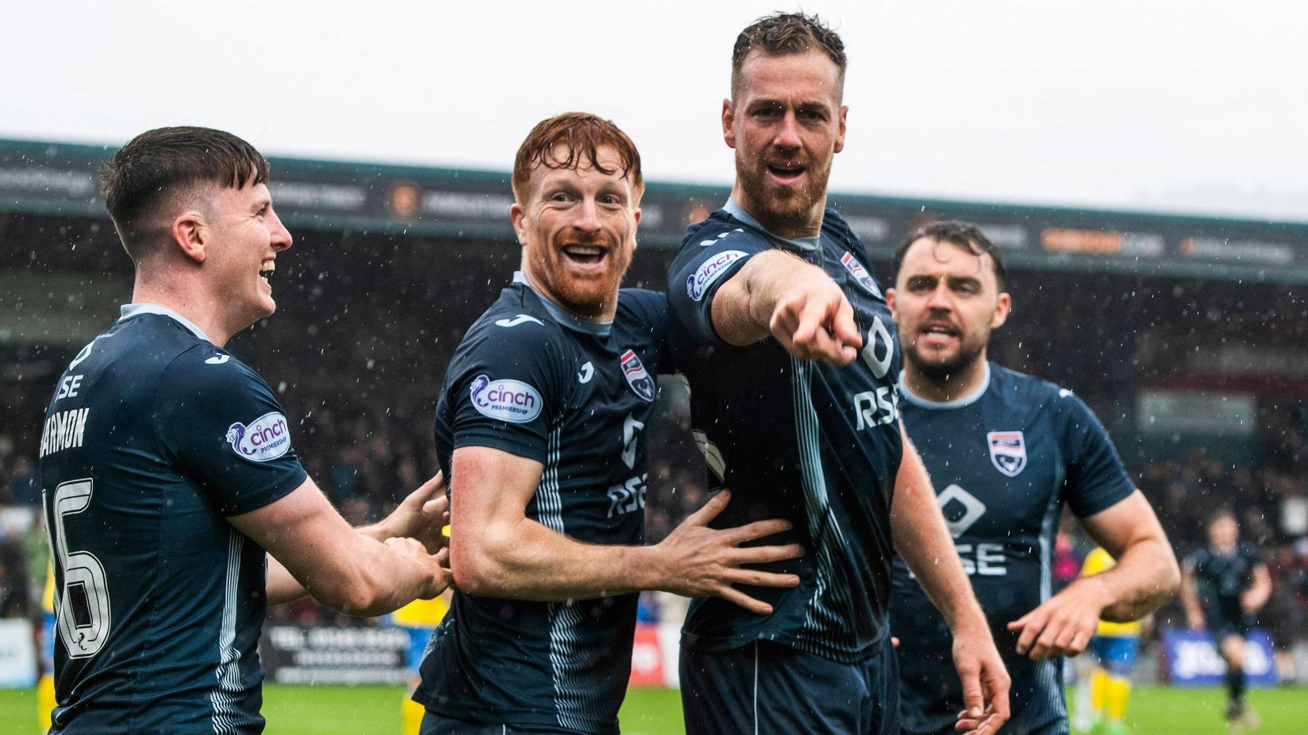 Ross County's George Harmon, Simon Murray and Jordan White celebrate