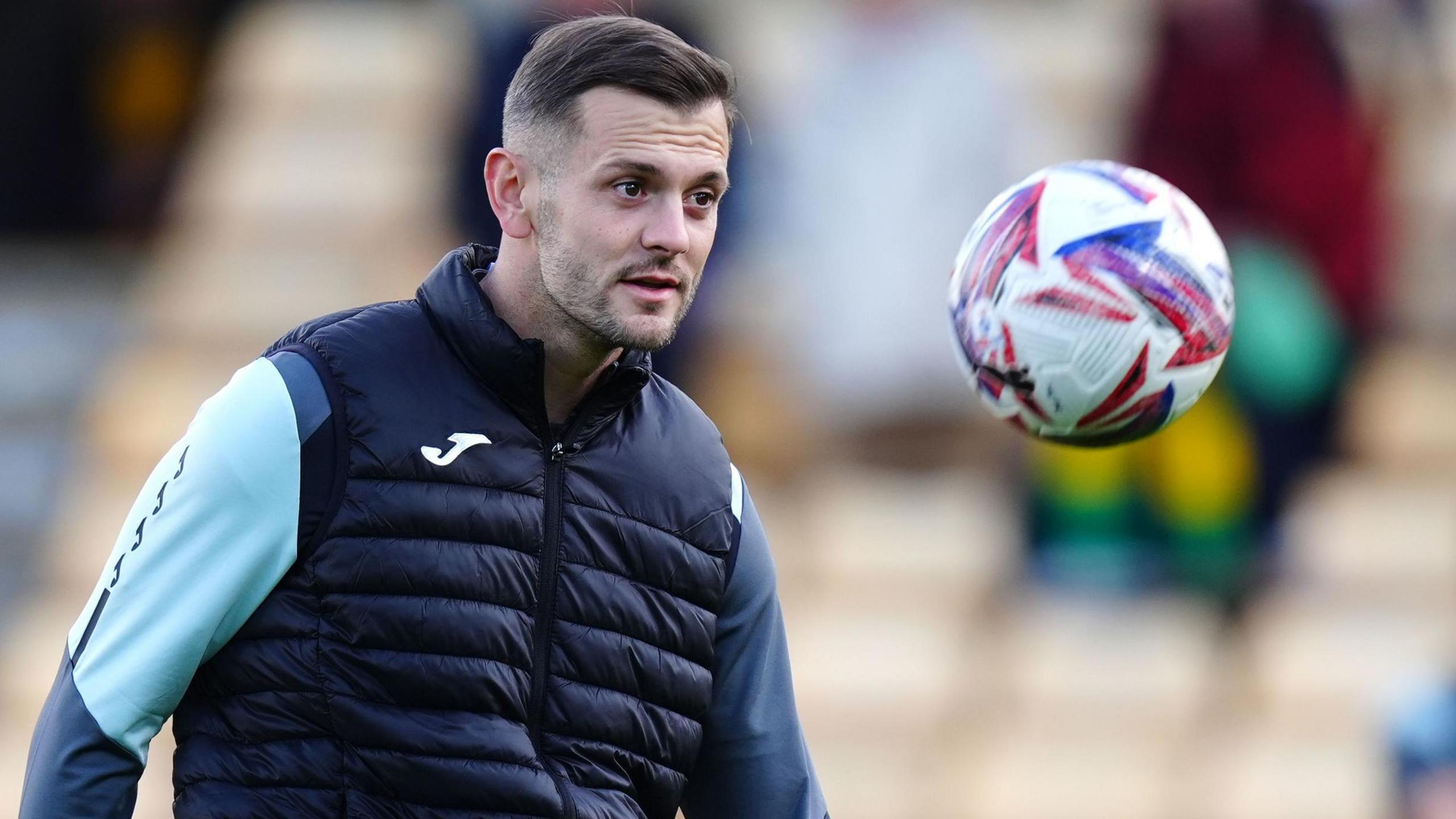 First-team coach Jack Wilshere working with the Norwich City players before kick-off against Middlesbrough