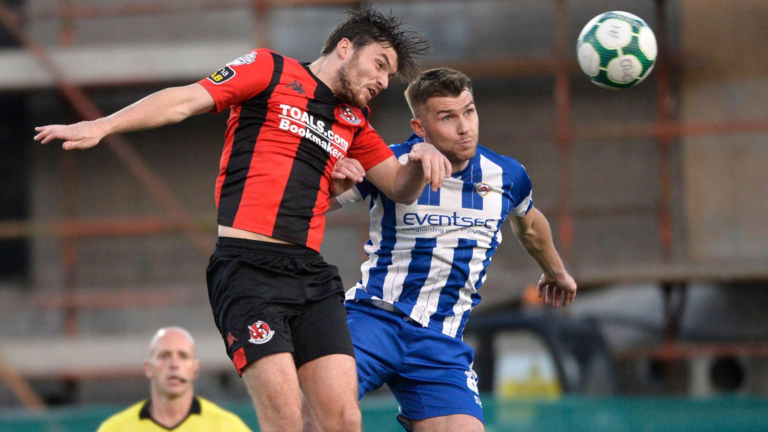 Philip and Stephen Lowry in action for Crusaders and Coleraine