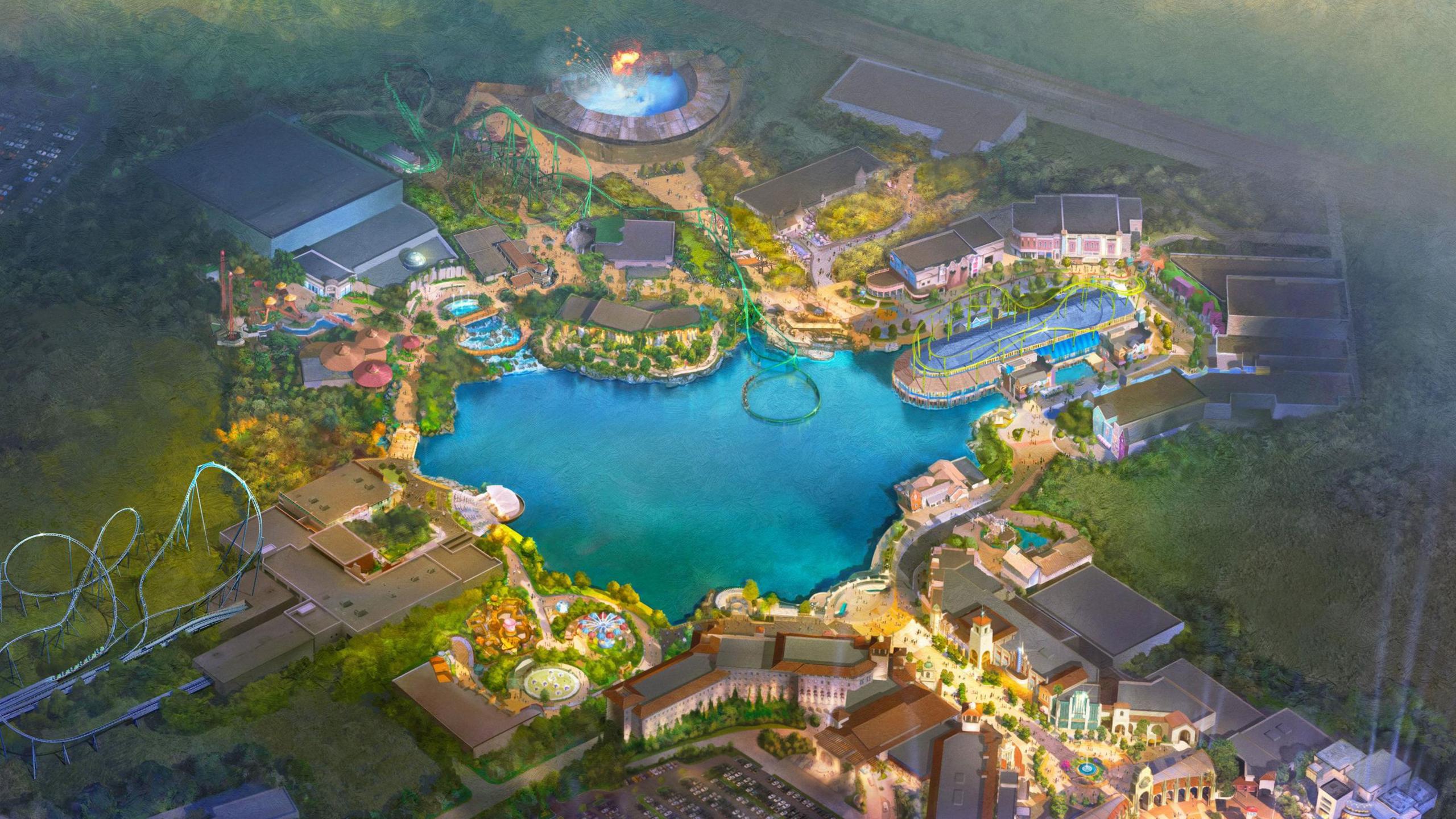 An artist's rendition of Universal's planned theme park near Bedford. It's a bird's eye shot showing a large body of water in the centre surrounded by various buildings and rollercoasters.