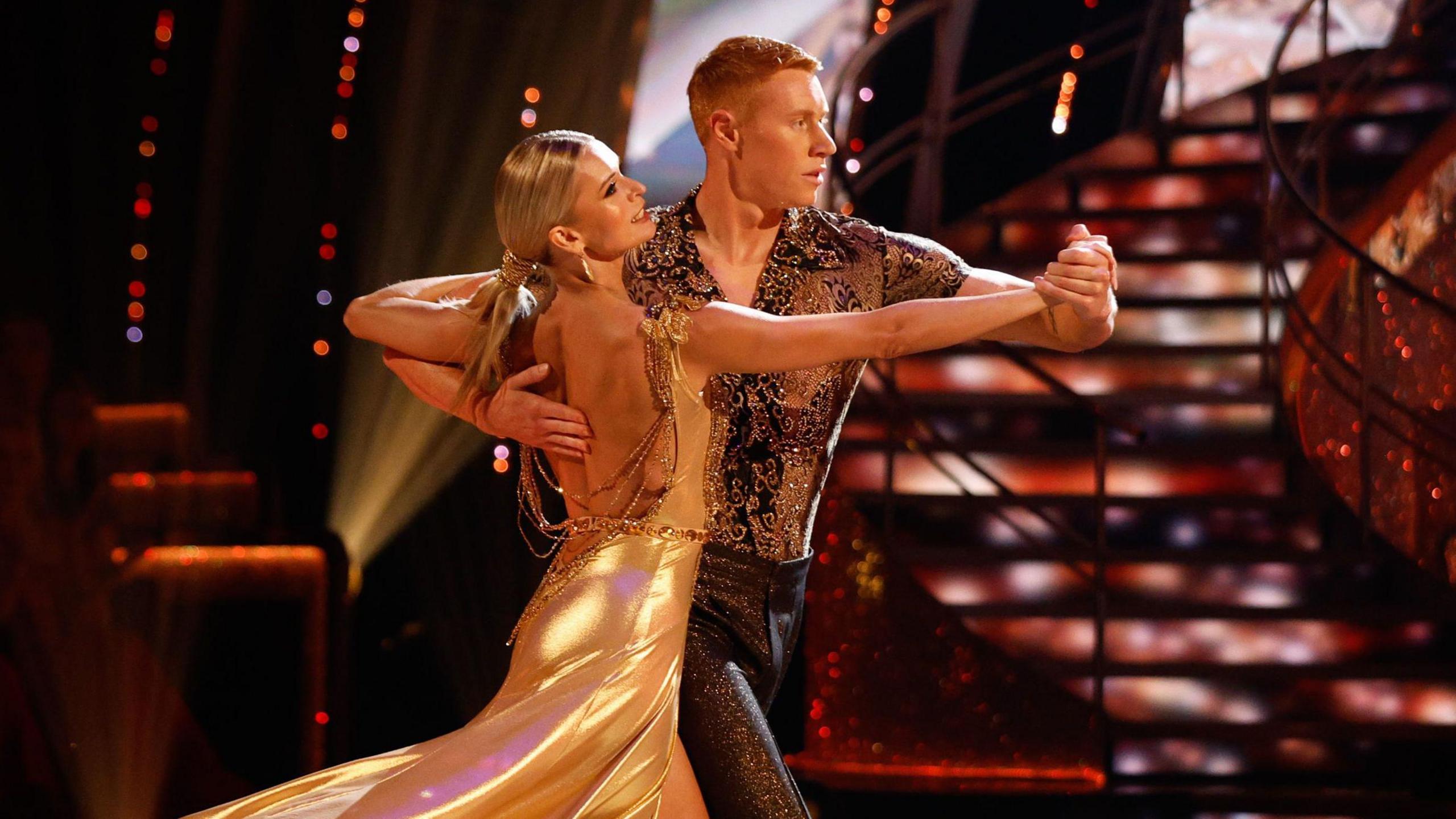 Tom Dean and Nadiya Bychkova dancing together