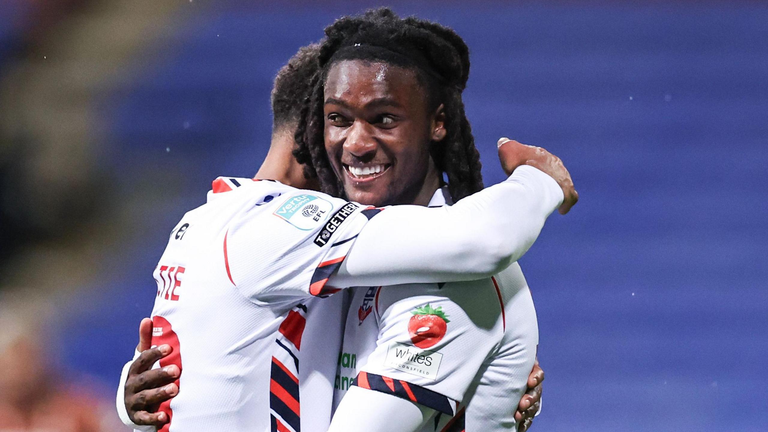 Bolton Wanderers footballer Ibrahim Cissoko celebrating a goal in a football match against Bradford City in the Vertu Trophy