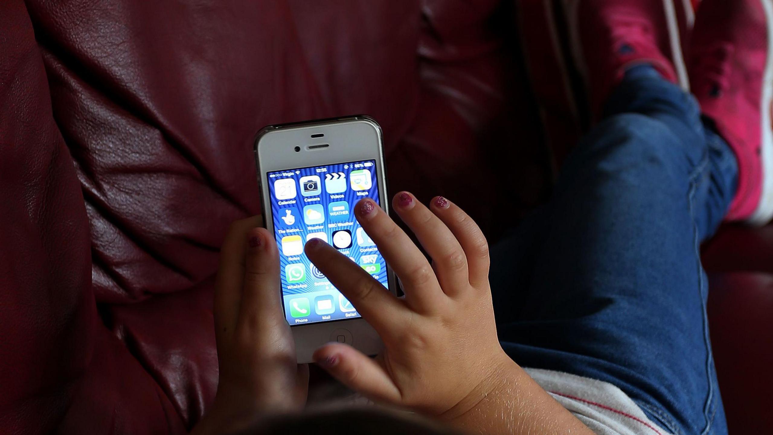 Child using mobile phone 