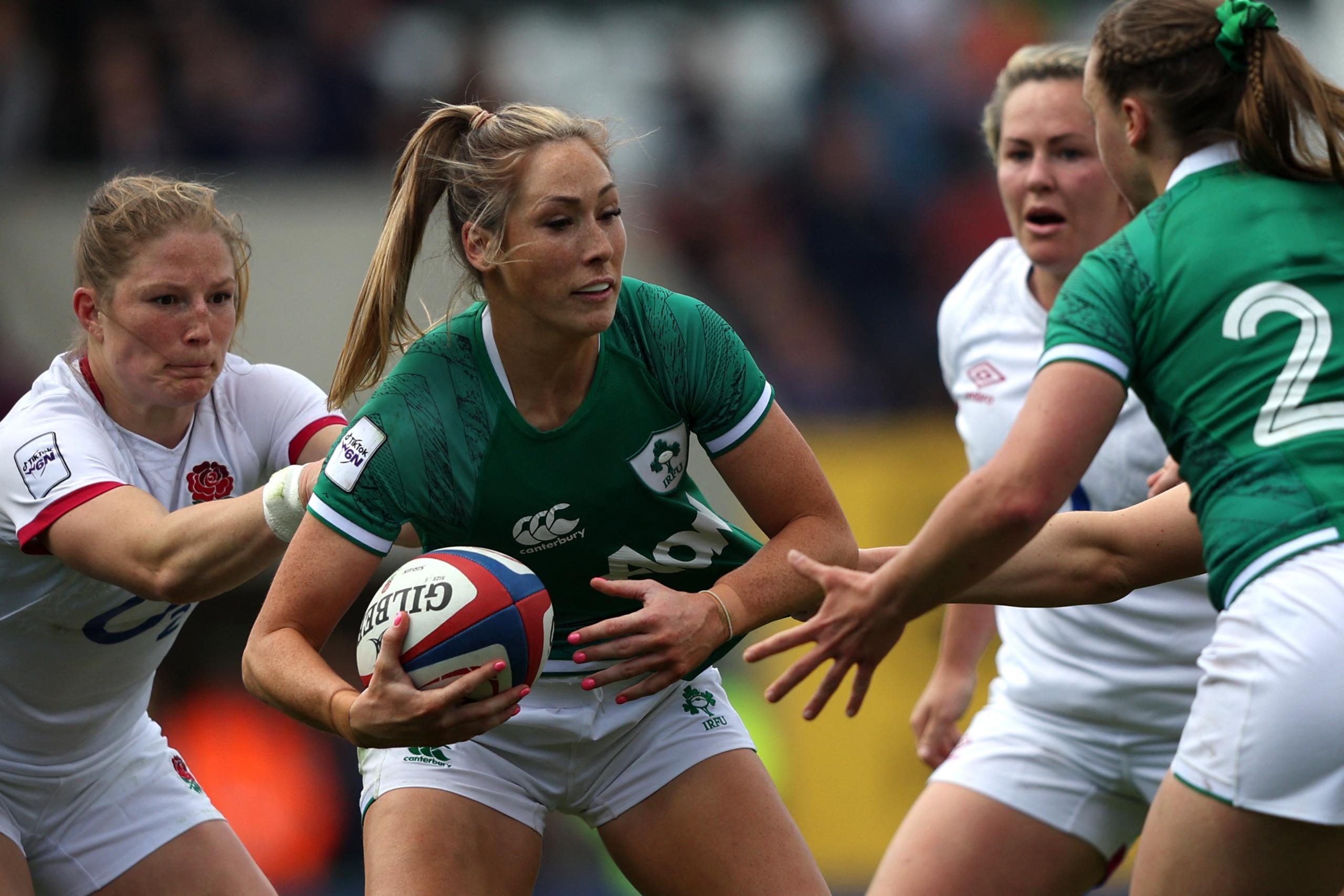 Ireland's wing Eimear Considine looks to offload during the Six Nations match against England