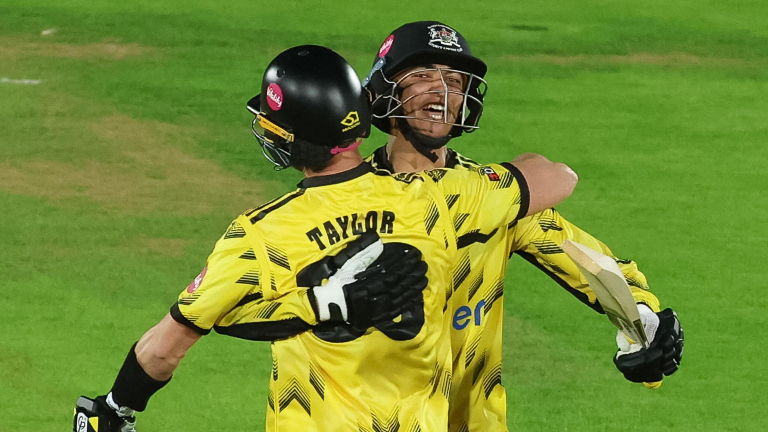 Matt Taylor and Kamran Dhariwal after securing victory for Gloucestershire away at Glamorgan