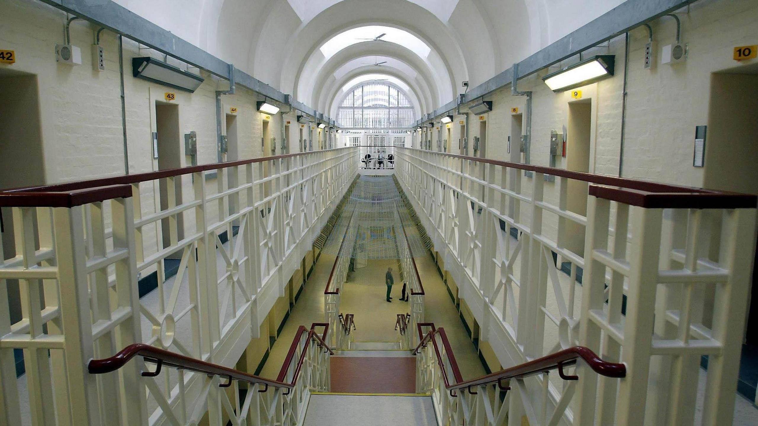 The interior of Wakefield Prison shows numbered cells on a wing