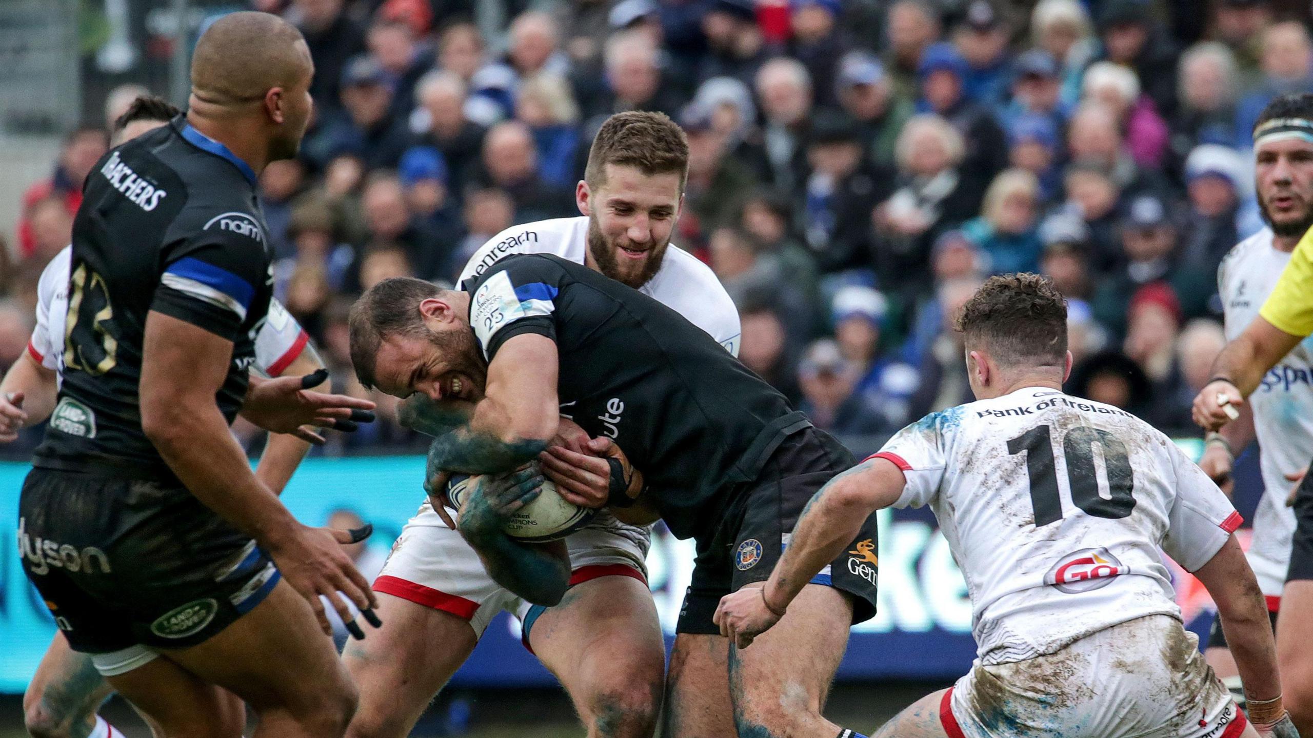 Stuart McCloskey and Jamie Roberts compete for the ball during Bath v Ulster in 2019
