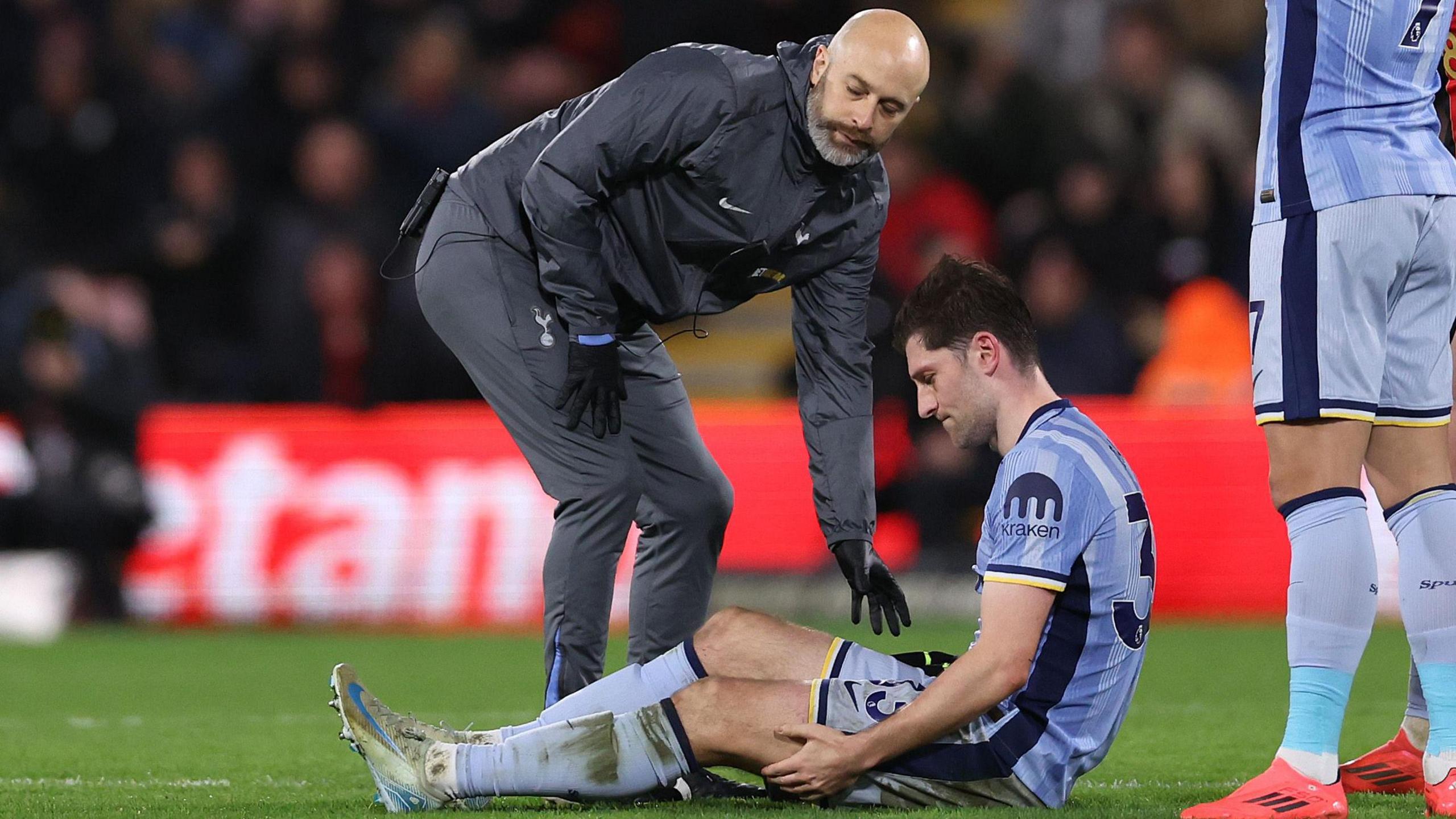 Ben Davies is treated during Tottenham's defeat at Bournemouth on Thursday