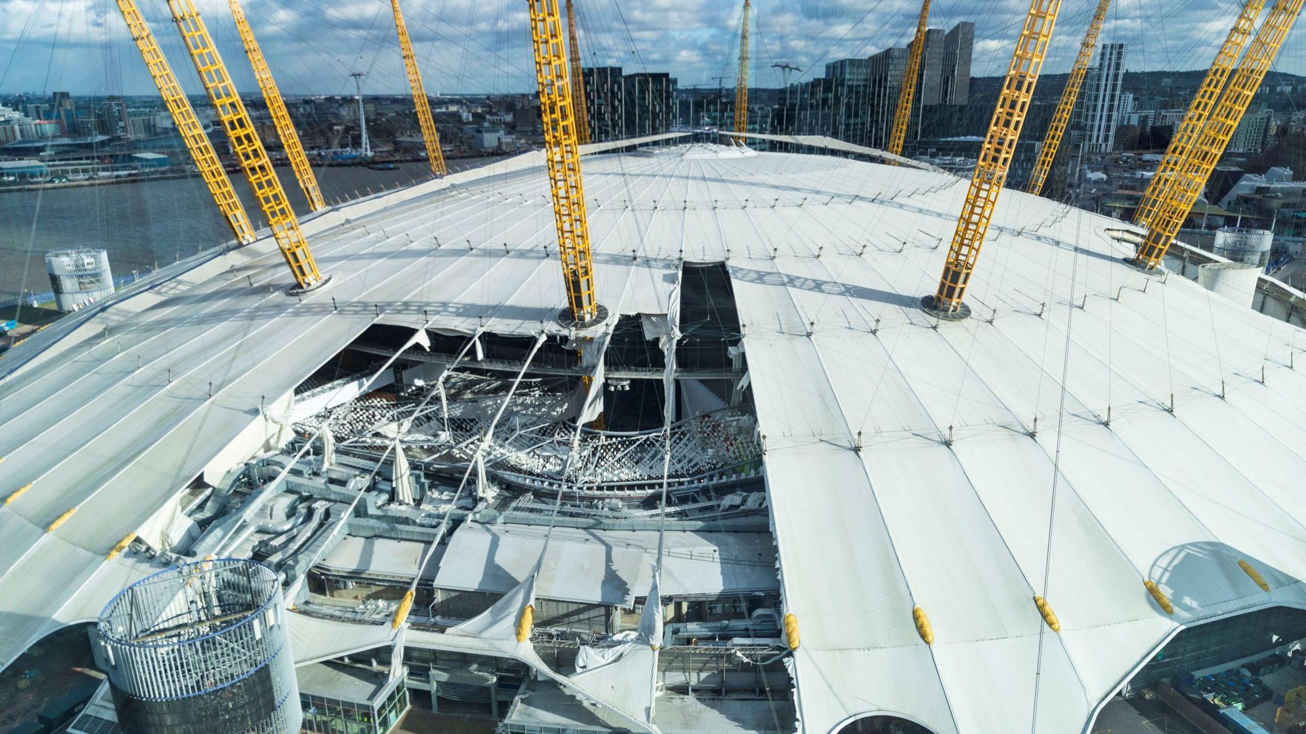 The roof of the O2 Arena in London with a piece missing following Storm Eunice in February 2022.